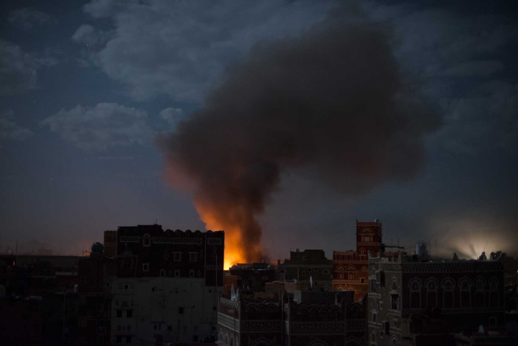 Smoke rises from an airstrike on Tuesday, June 9, 2015 in Sana'a, Yemen.