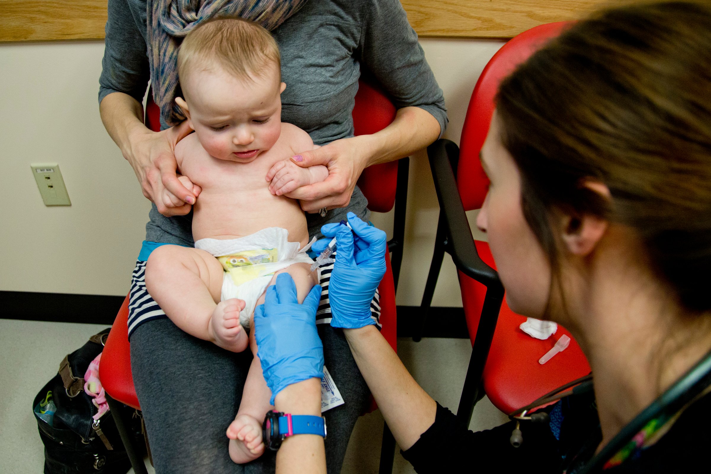 Sad baby, but smart mom: a child is vaccinated against meningitis in Portland, Me.