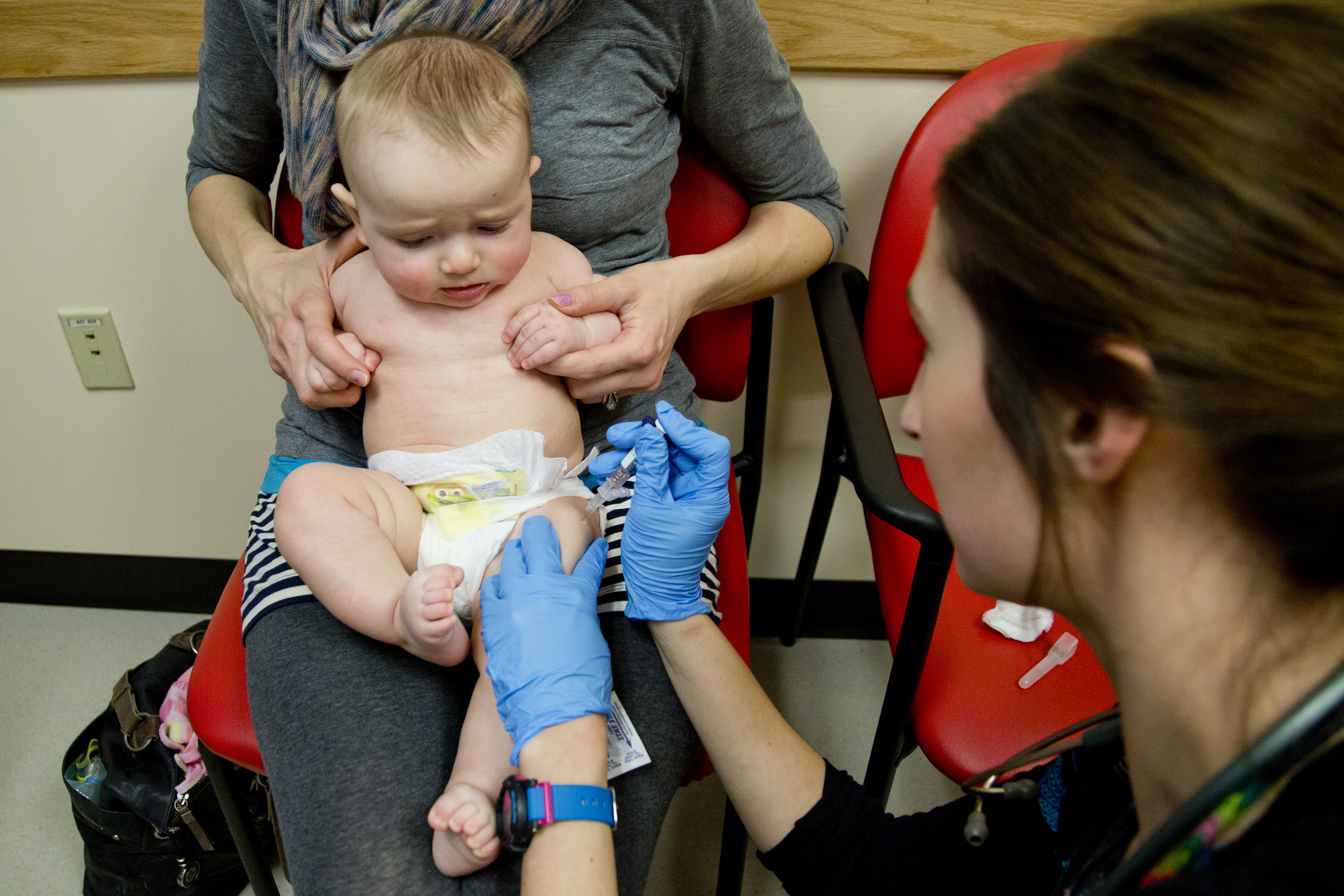 Sad baby, but smart mom: a child is vaccinated against meningitis in Portland, Me. (Portland Press Herald; Press Herald via Getty Images)