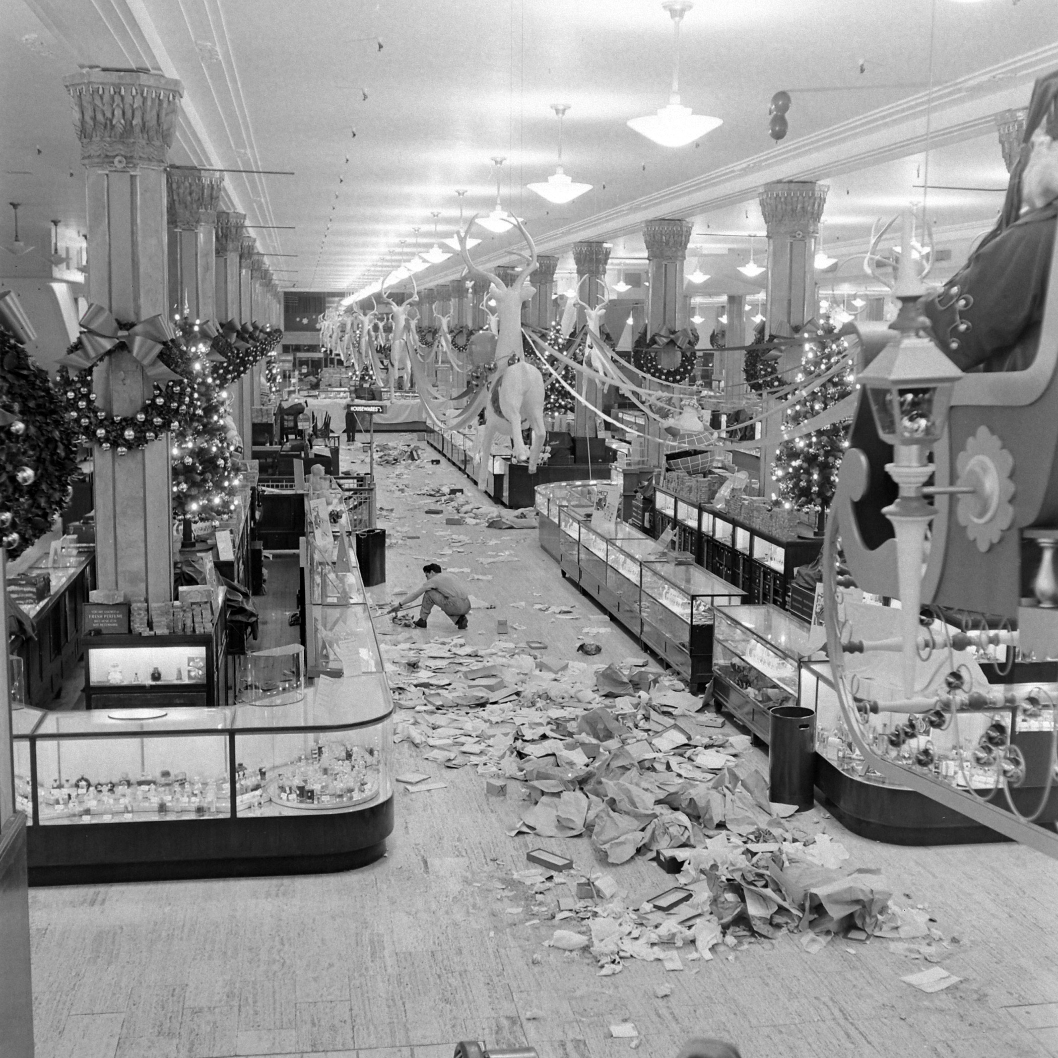 The mess in the wake of a major sale day at Macy's. New York, 1948.