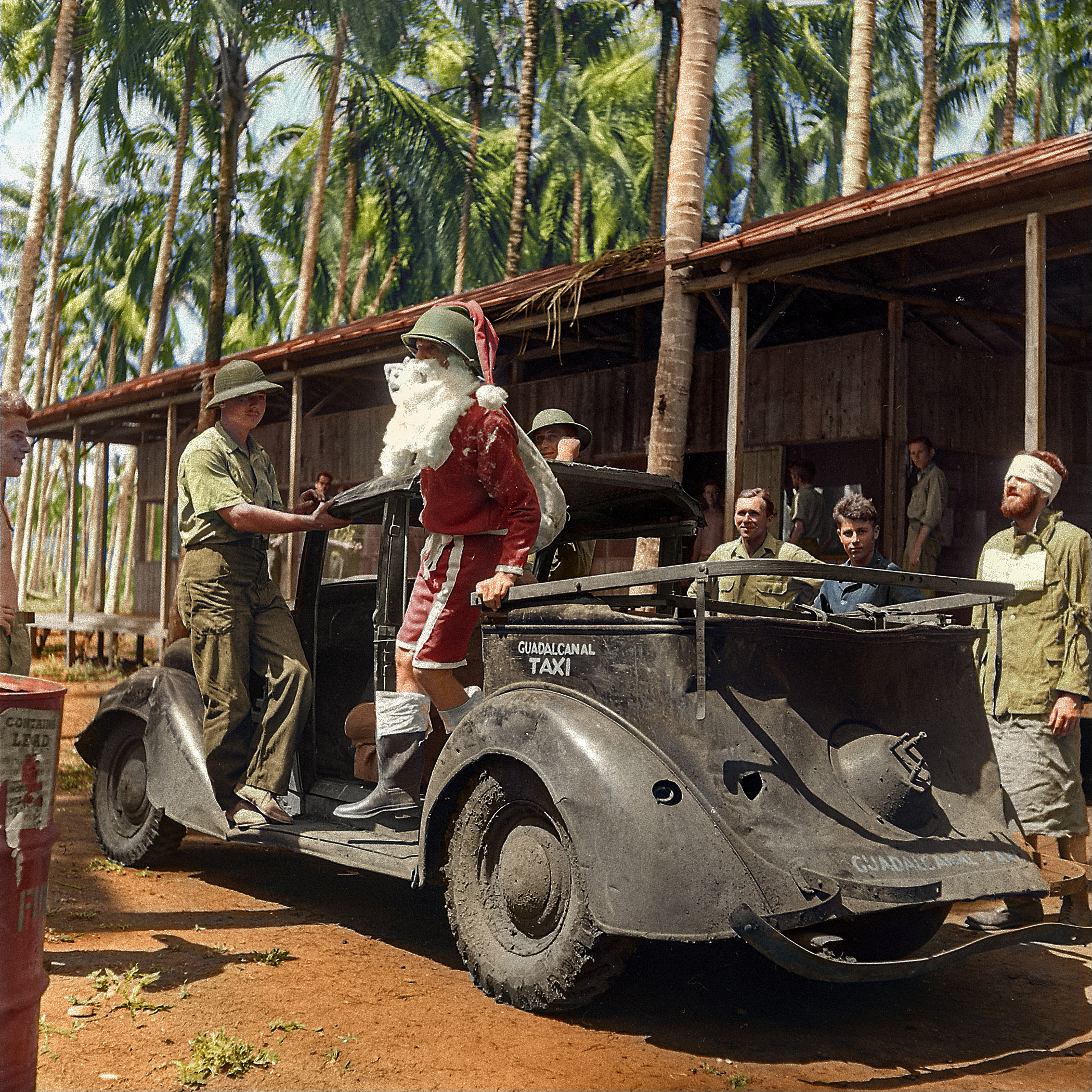 Santa arrives to entertain Allied troops on Christmas on Guadalcanal. Solomon Islands, 1960.