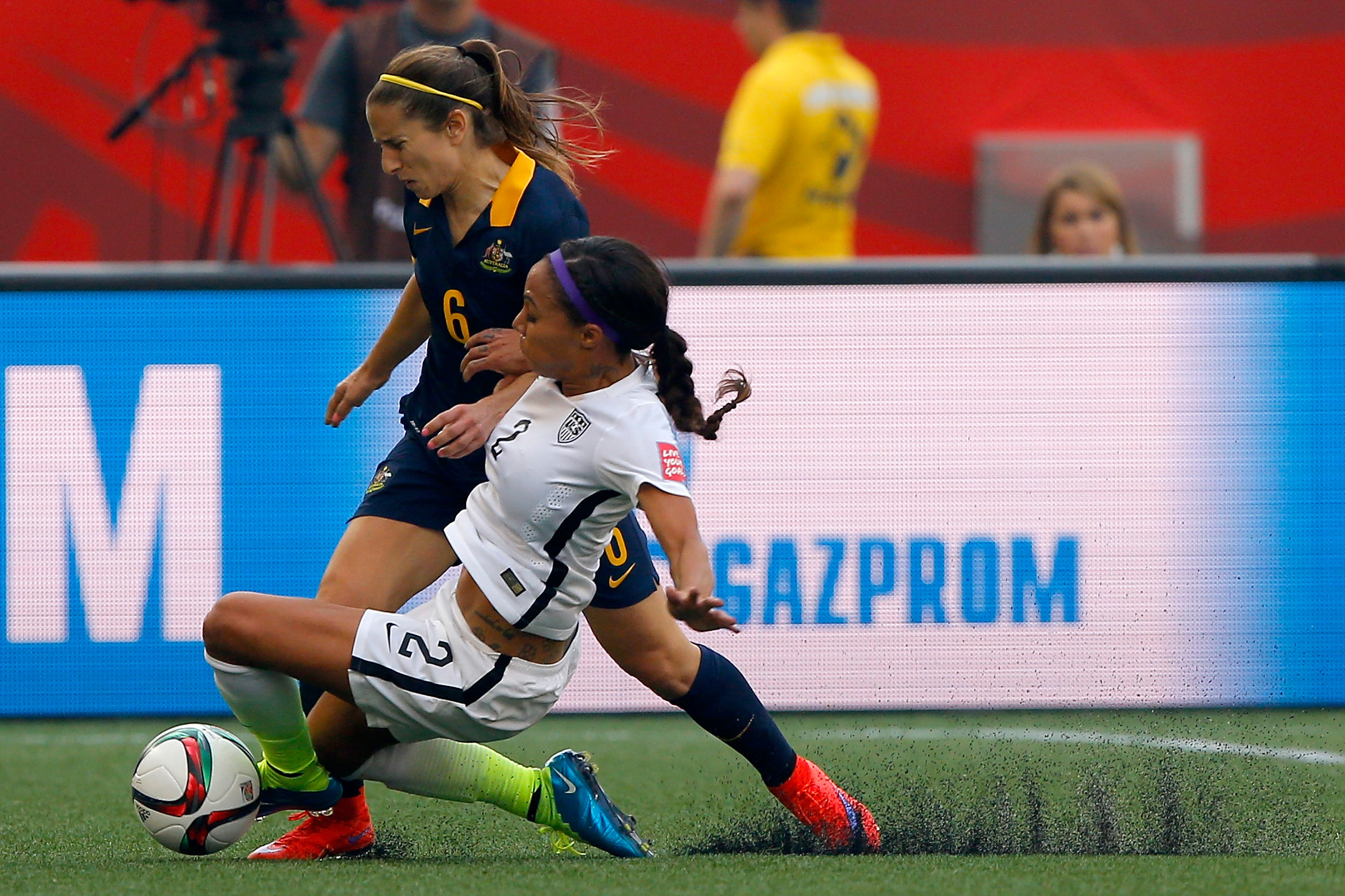 Sydney Leroux of the U.S. challenges Servet Uzunlar of Australia in the first half during the FIFA Women's World Cup 2015 Group D match at Winnipeg Stadium in Winnipeg, Canada, on June 8, 2015 (Kevin C. Cox—Getty Images)