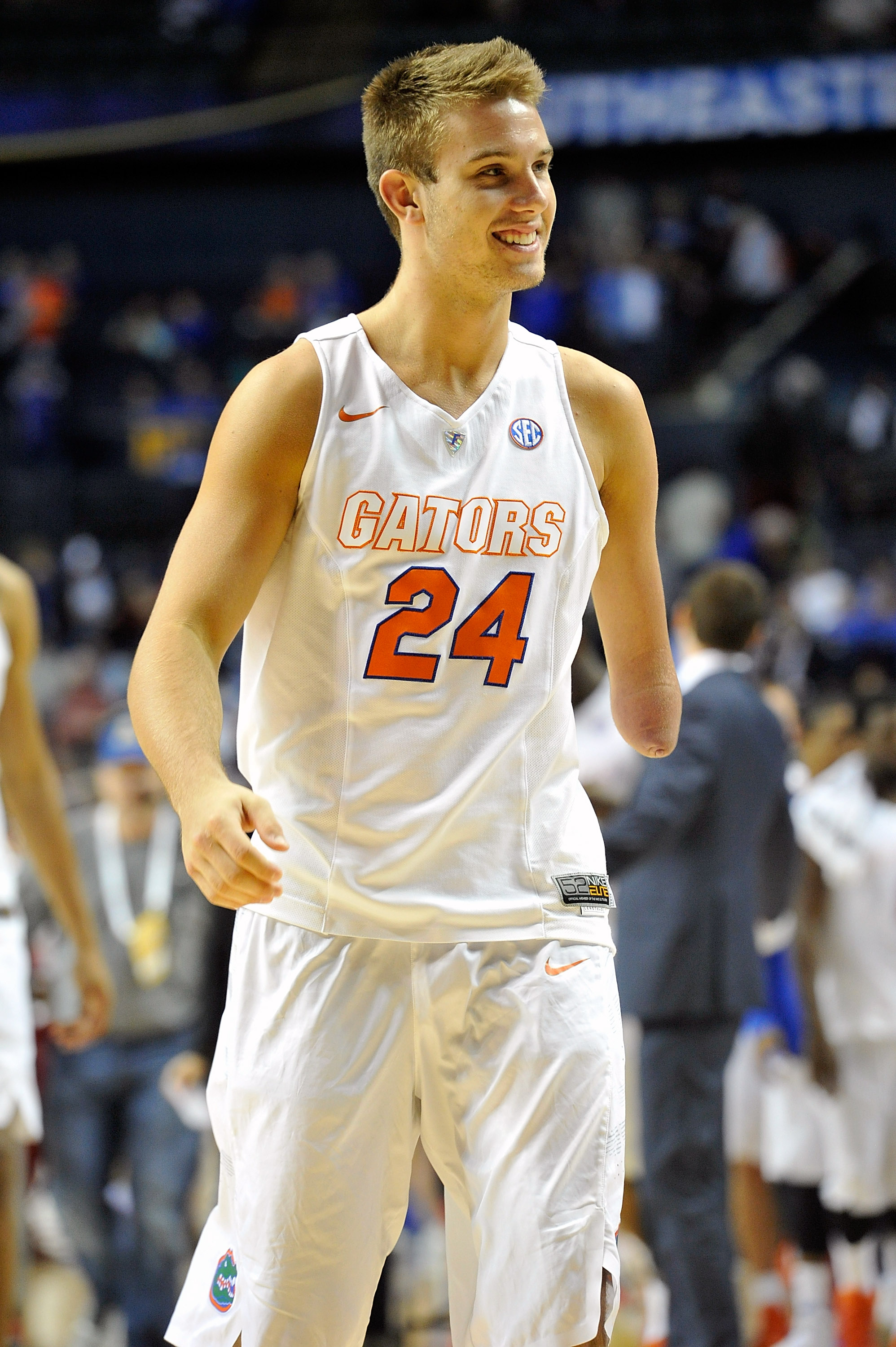 Zach Hodskins #24 of the Florida Gators smiles after defeating the Alabama Crimson Tide in a second round game of the SEC Basketball Tournament at Bridgestone Arena on March 12, 2015 in Nashville. (Frederick Breedon—Getty Images)