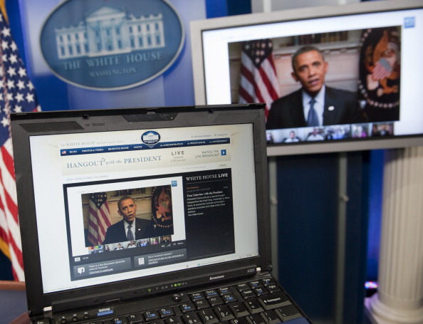 US President Barack Obama participates in an interview with YouTube and Google from the Roosevelt Room of the White House in Washington, DC, January 30, 2012, as seen on a laptop in the Brady Press Briefing Room. The interview, held through a Google+ Hangout, marks the first completely virtual interview of a US President from the White House.  SAUL LOEB&mdash;AFP/Getty Images (SAUL LOEB&mdash;AFP/Getty Images)