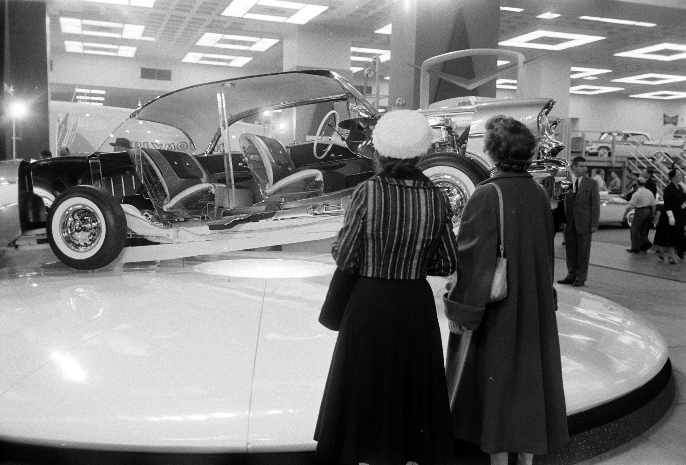 National Automobile Show at the New York Coliseum featuring 1957 lines.