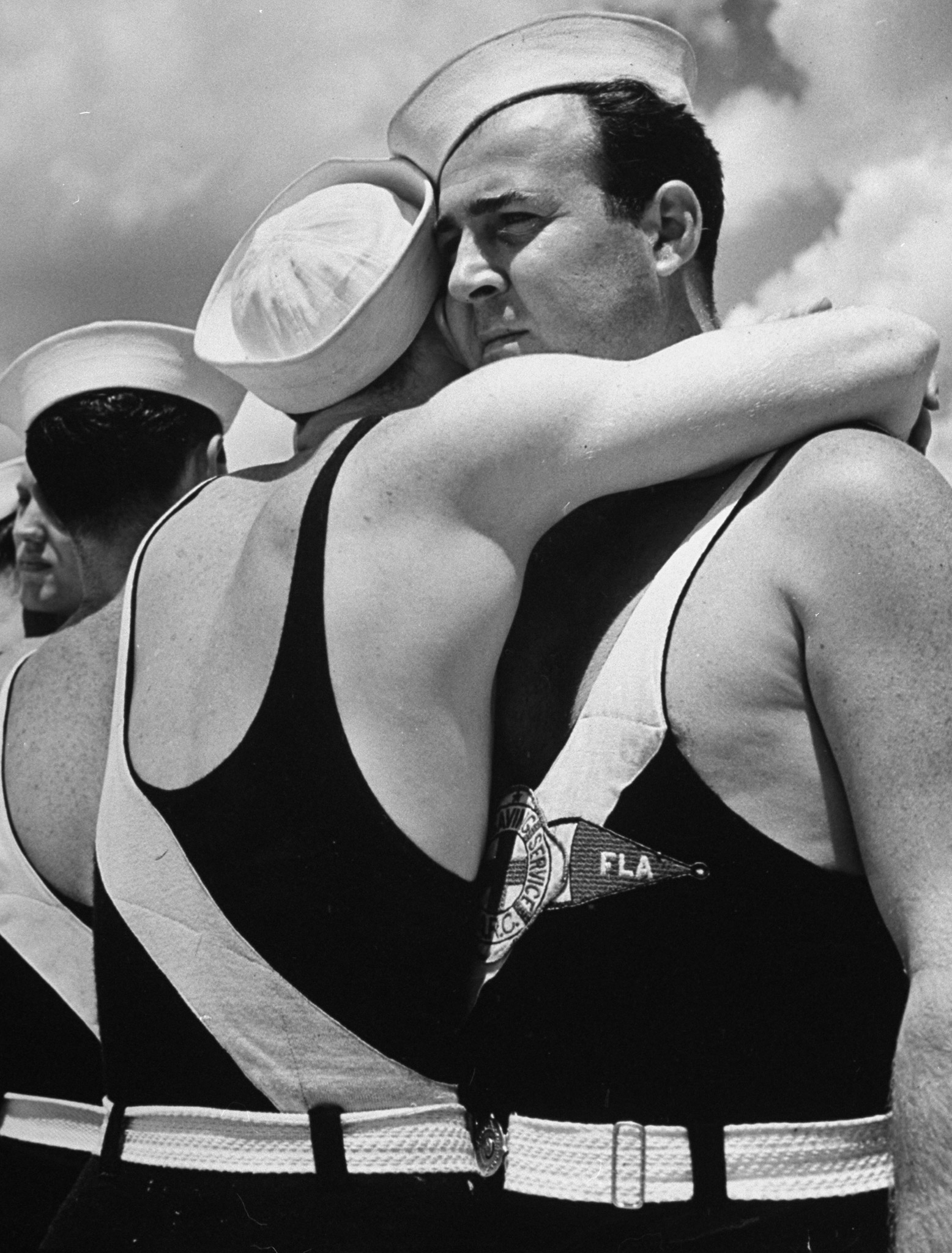 Two lifeguards hugging, Florida, 1939.