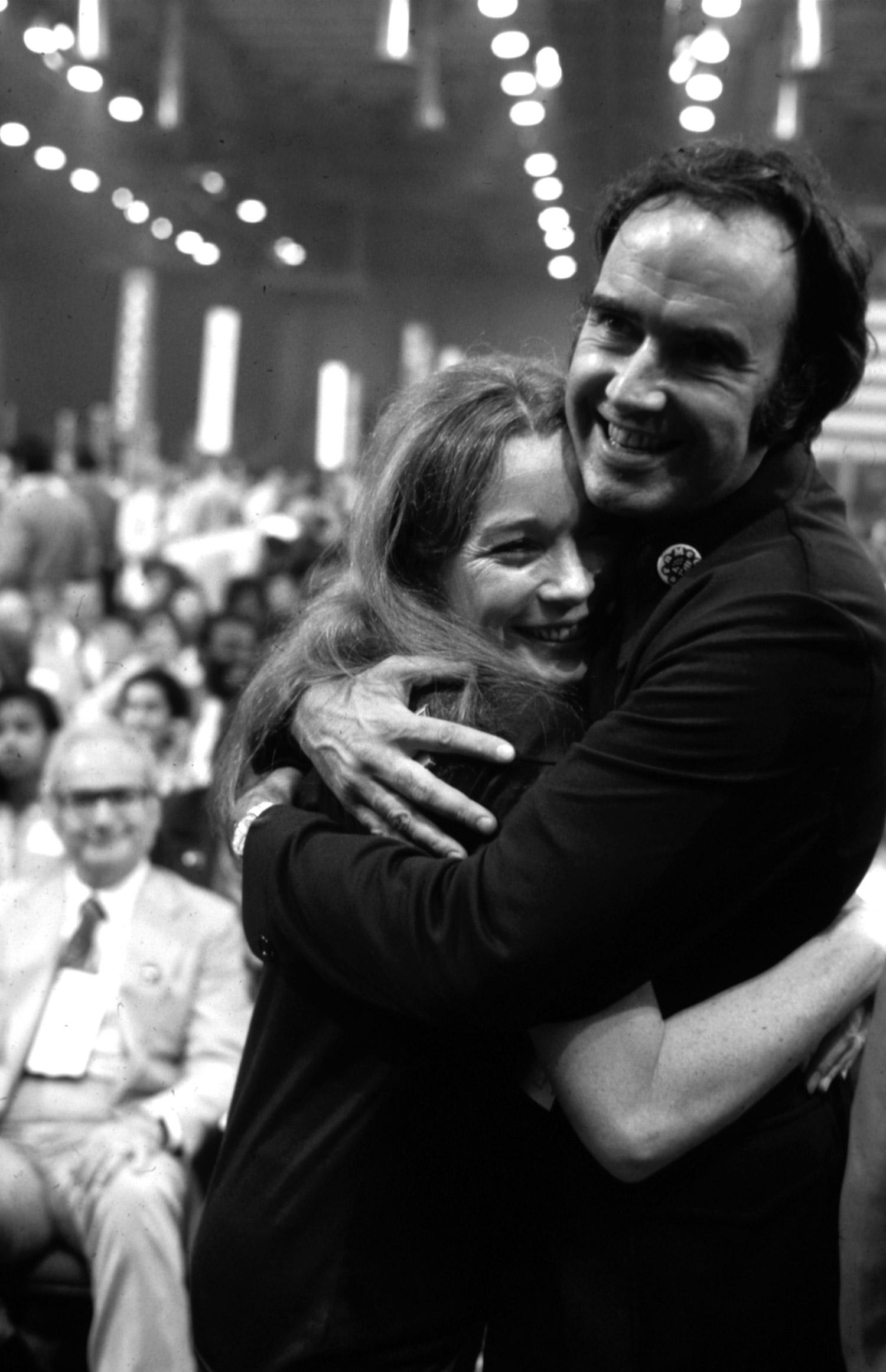 Shirley MacLaine hugging fellow delegate after McGovern victory at the Democratic National Convention, 1972.