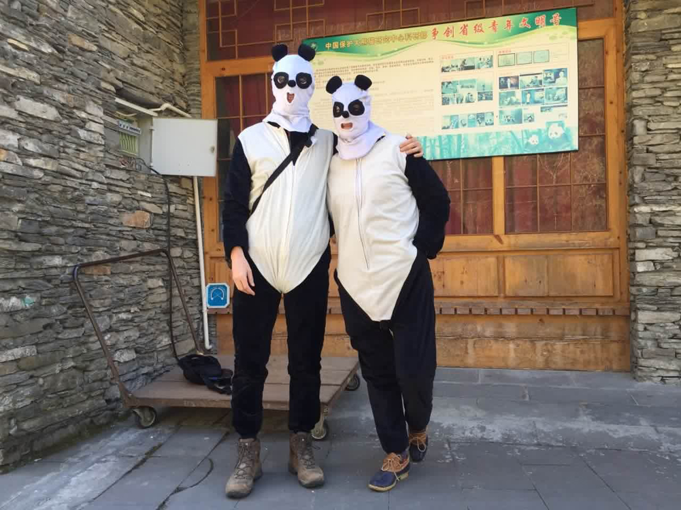 Photographer Adam Dean and TIME correspondent Hannah Beech wearing panda costumes while they report on the pandas at the Hetaoping Research and Conservation Center for the Giant Panda in Wolong, National Nature Reserve Sichuan Province, China, Dec 1, 2015.