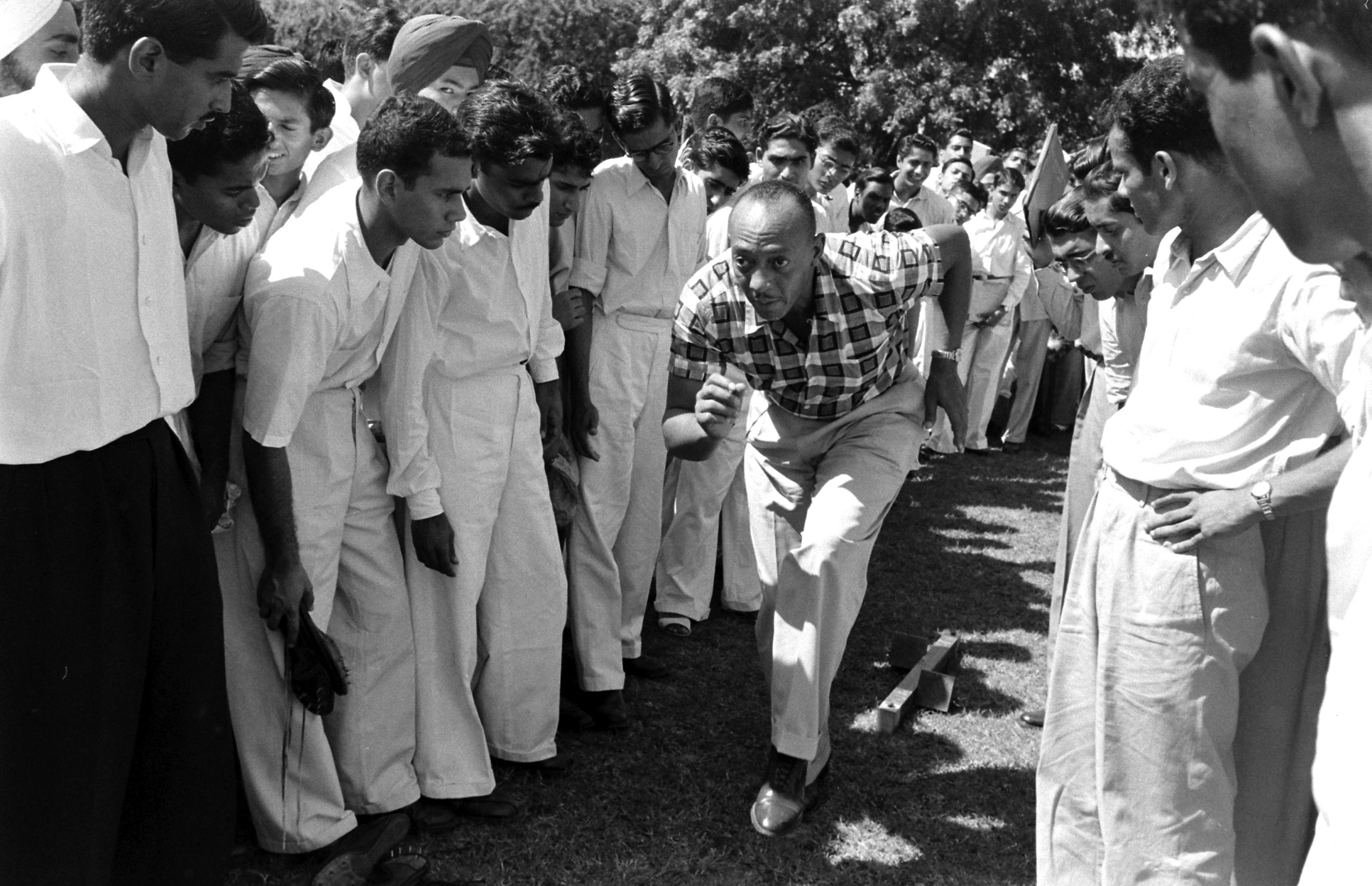 Track star Jesse Owens in India, 1955