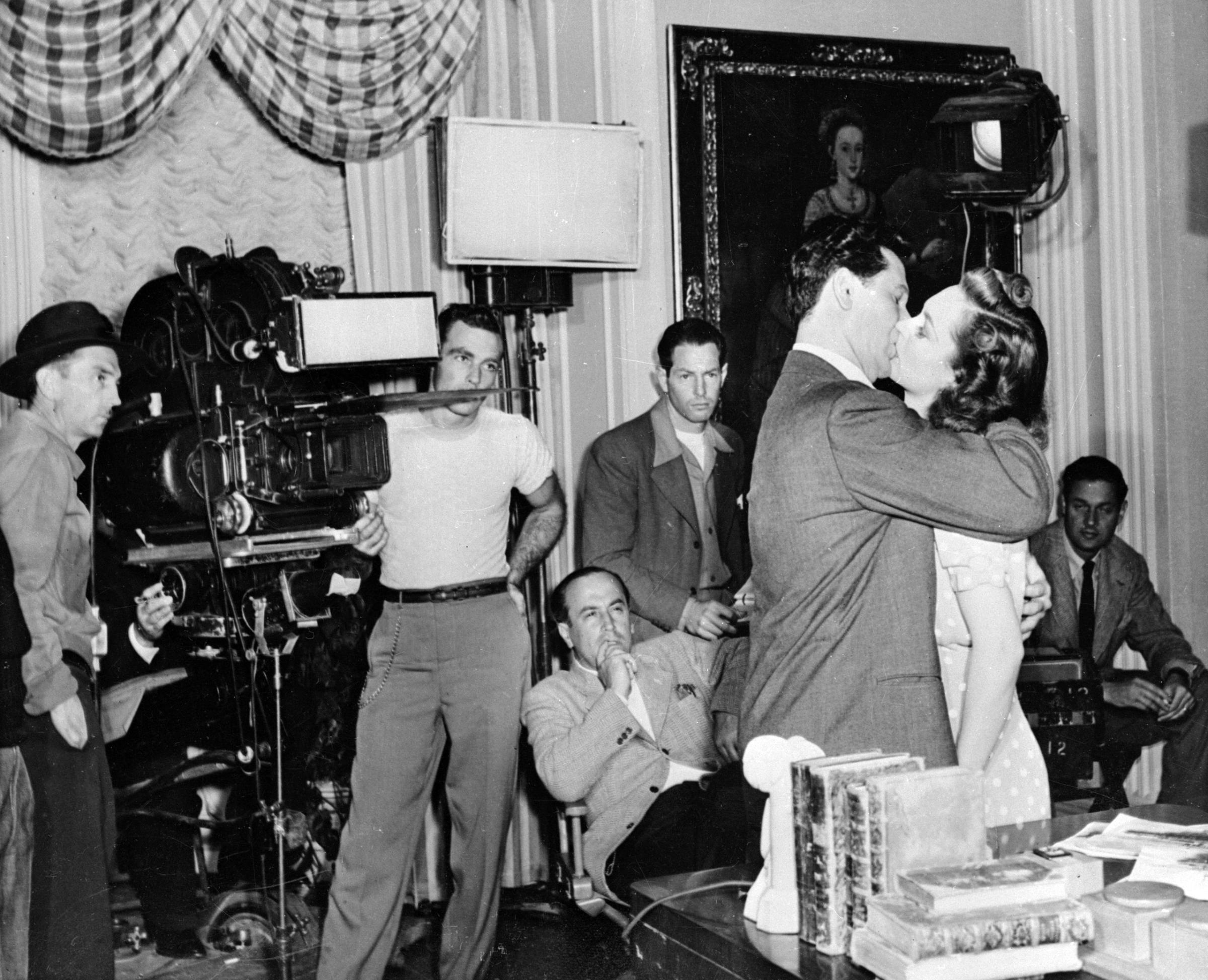 A film crew shoot a kissing scene at the Warner Brothers Film Studios in Hollywood, 1946.