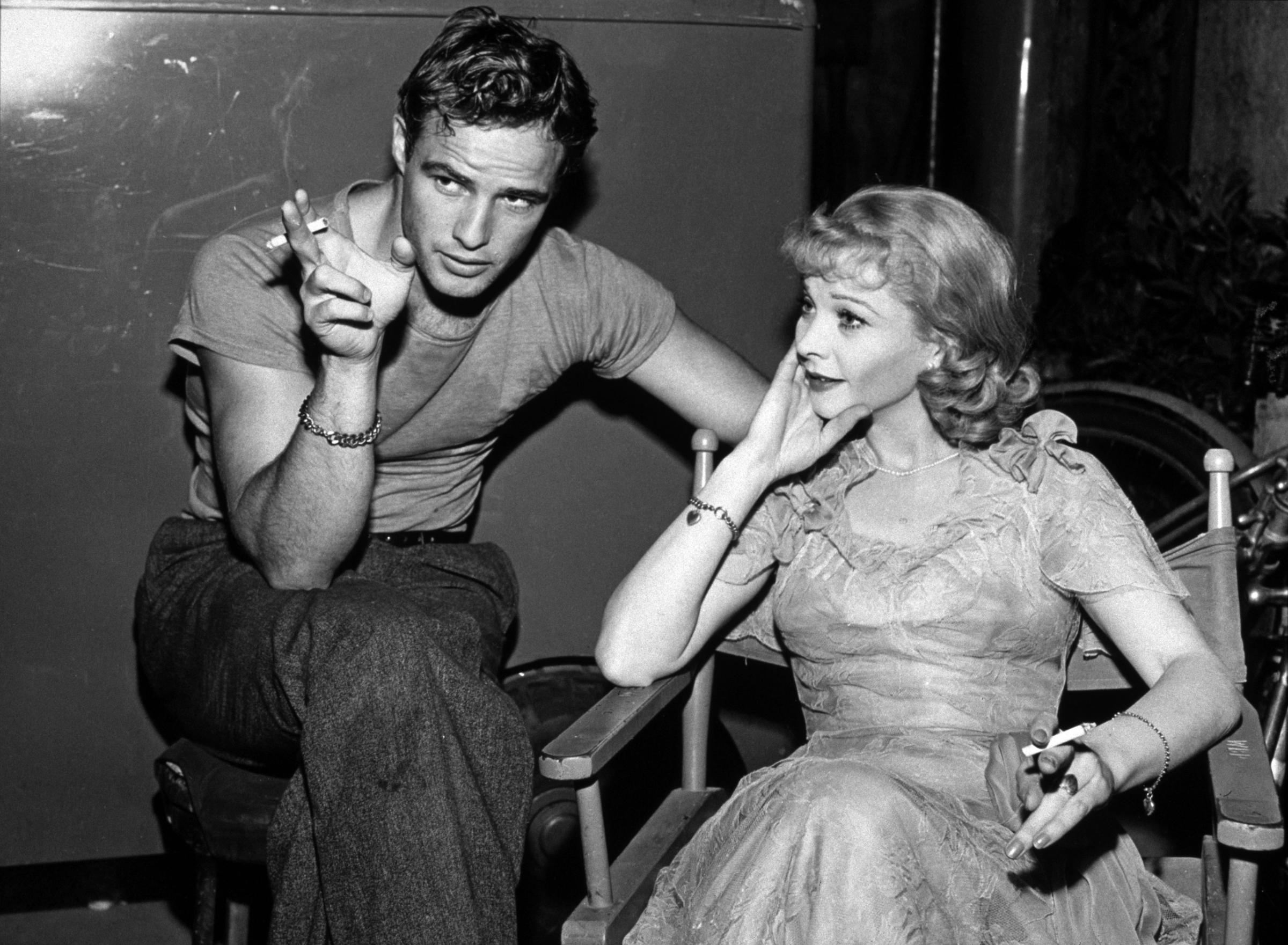Marlon Brando and Vivien Leigh relax on the set of 'A Streetcar Named Desire', circa 1951.