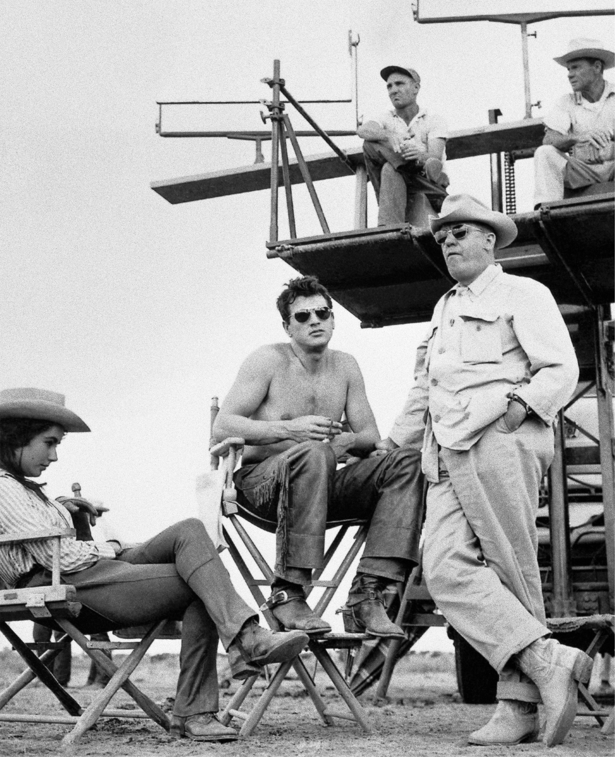 Elizabeth Taylor, actor Rock Hudson and director George Stevens on the set of the movie "Giant," 1956.