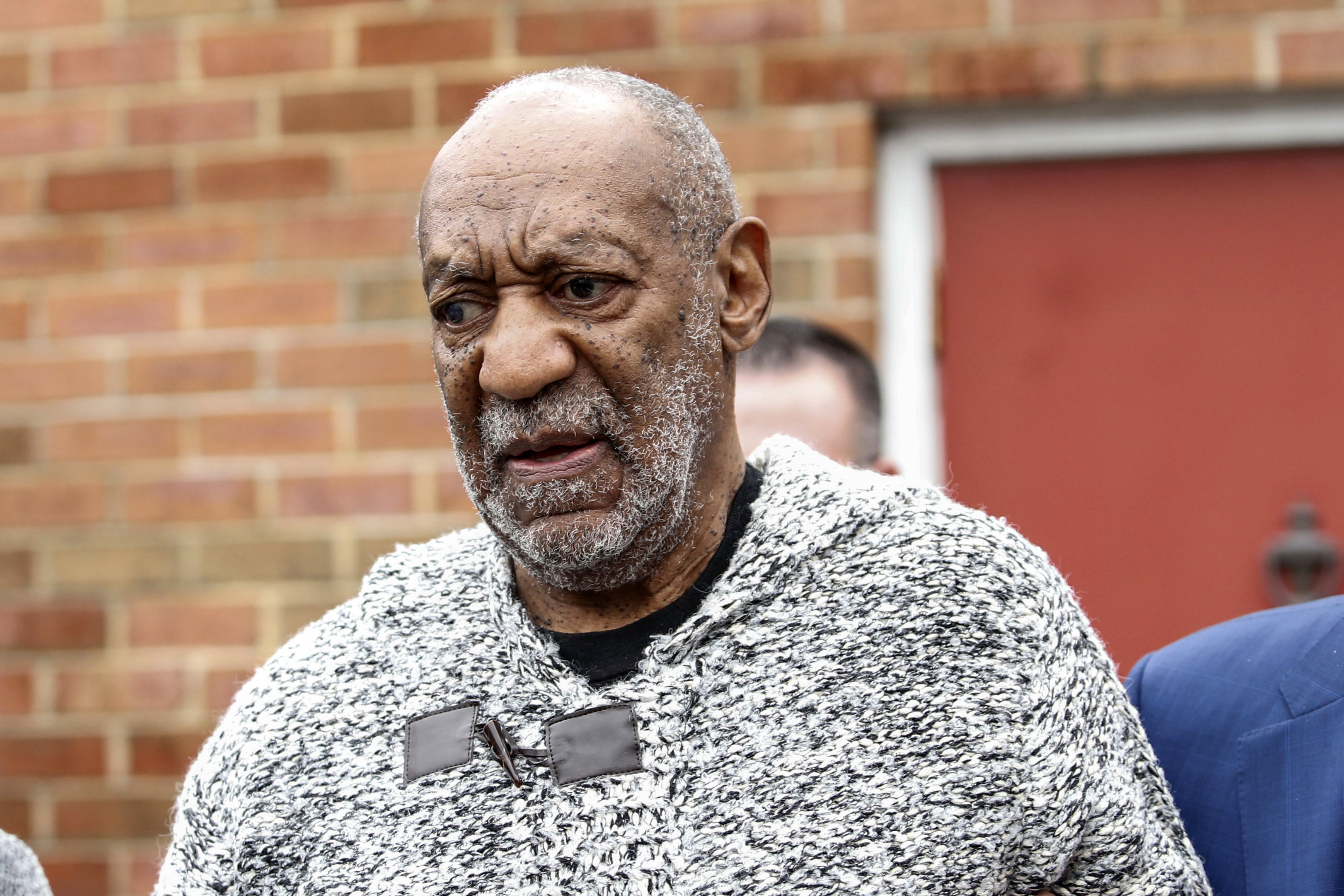 Comedian Bill Cosby leaves Dec. 30, 2015 the Court House in Elkins Park, Pennsylvania after arraignment on charges of aggravated indecent assault. (Kena Betancur—AFP/Getty Images)