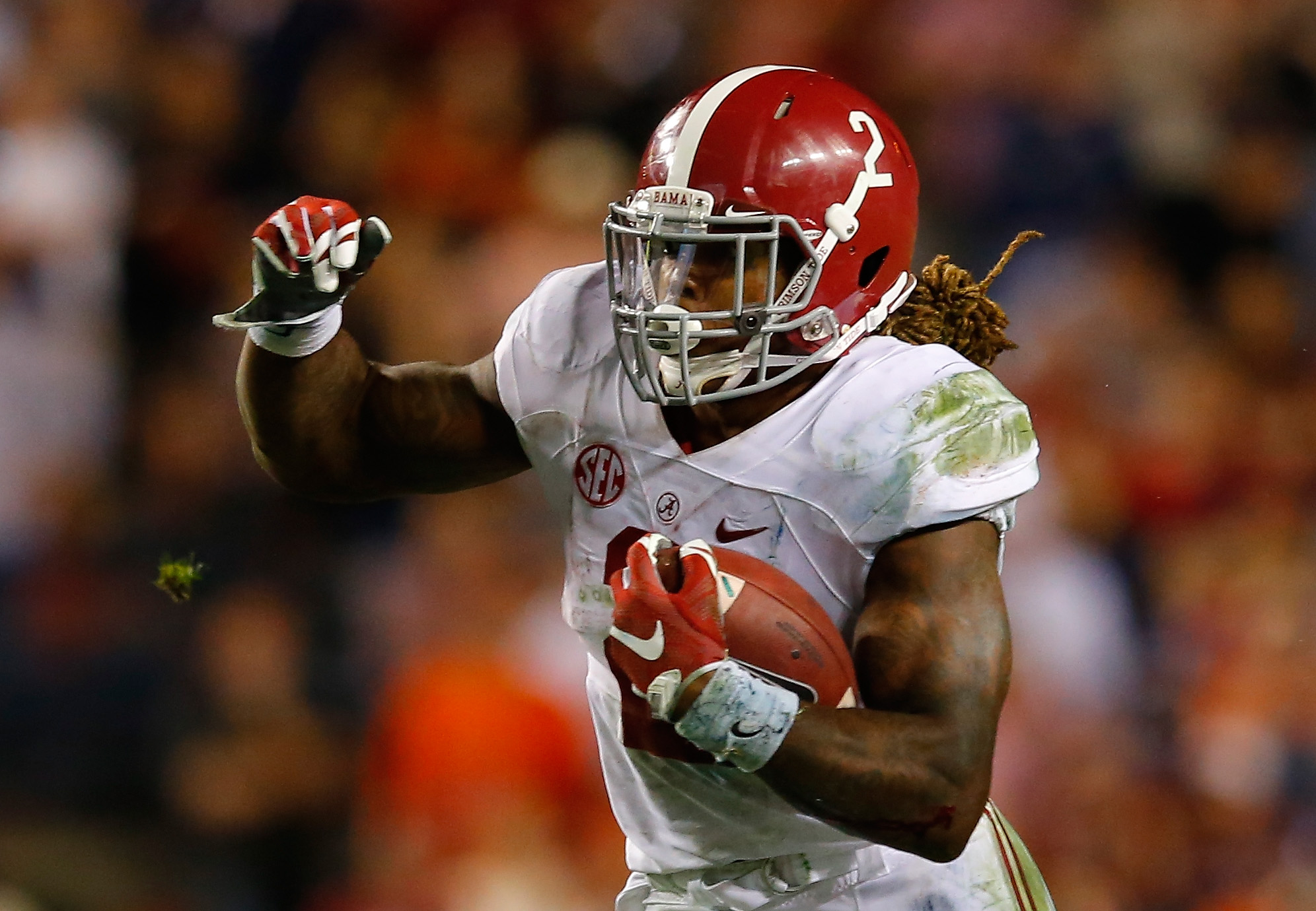 Derrick Henry #2 of the Alabama Crimson Tide rushes against the Auburn Tigers at Jordan Hare Stadium in Auburn, Alabama on Nov. 28, 2015. (Kevin C. Cox—Getty Images)