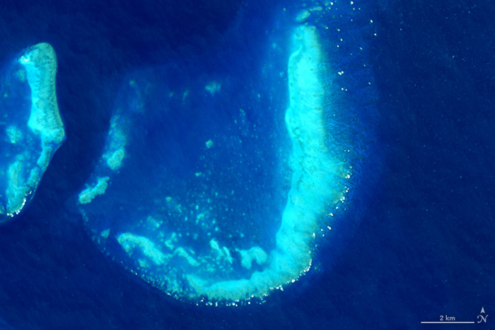 The Operational Land Imager on Landsat 8 captured this image of the Trunk Reef near Townsville, Australia on July 17, 2015.