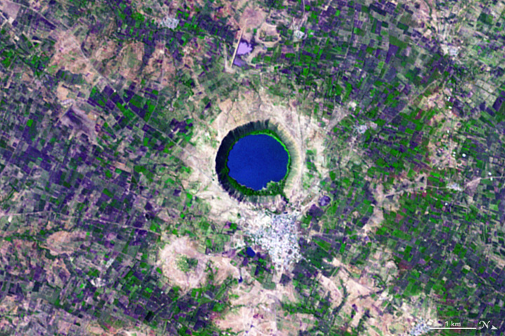 The Advanced Spaceborne Thermal Emission and Reflection Radiometer (ASTER) on NASA’s Terra satellite acquired this image of Lonar Crater in India on Nov. 29, 2004.