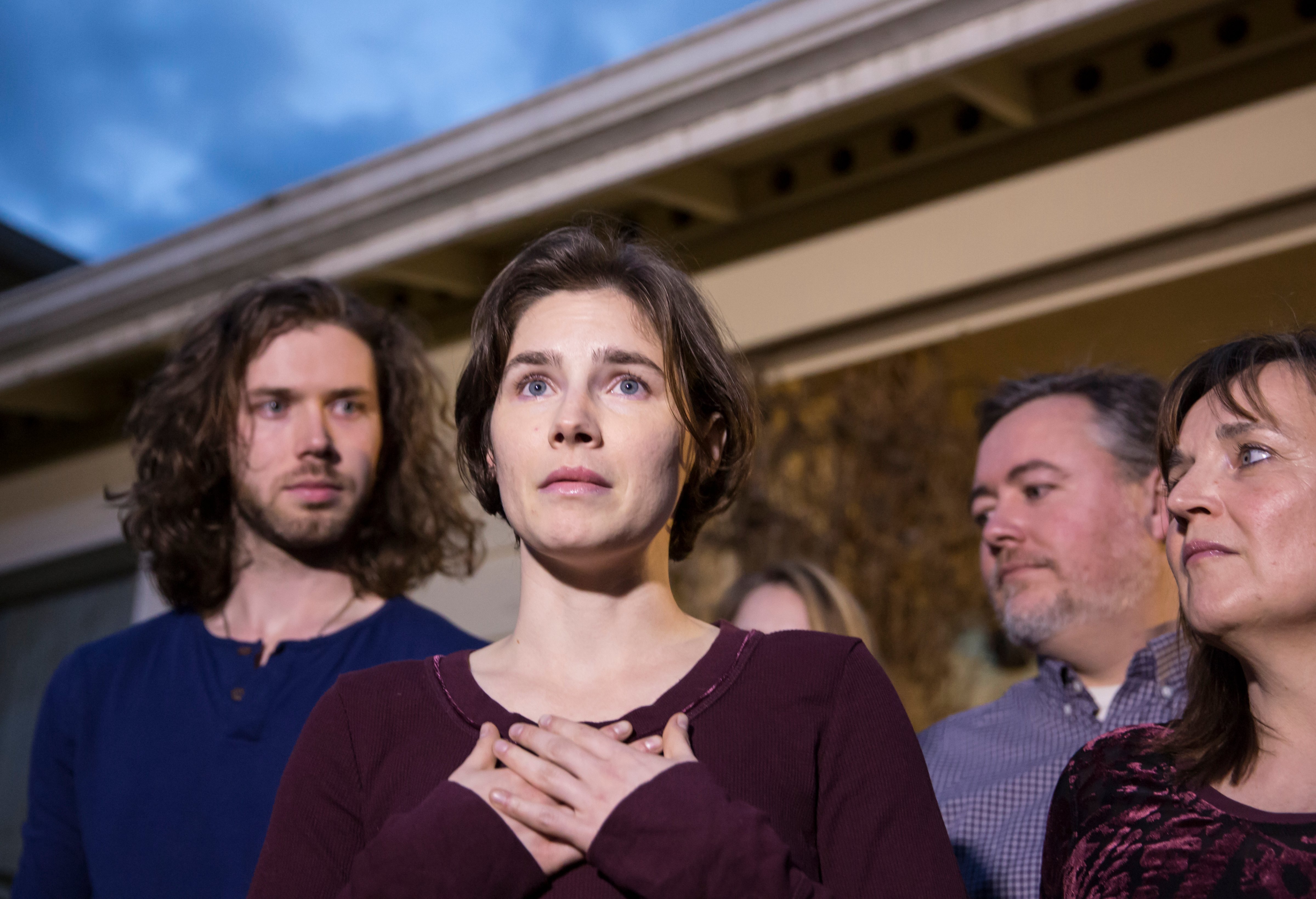 Amanda Knox speaks to the media during a brief press conference in front of her parents' home in Seattle on March 27, 2015. (Stephen Brashear—Getty Images)