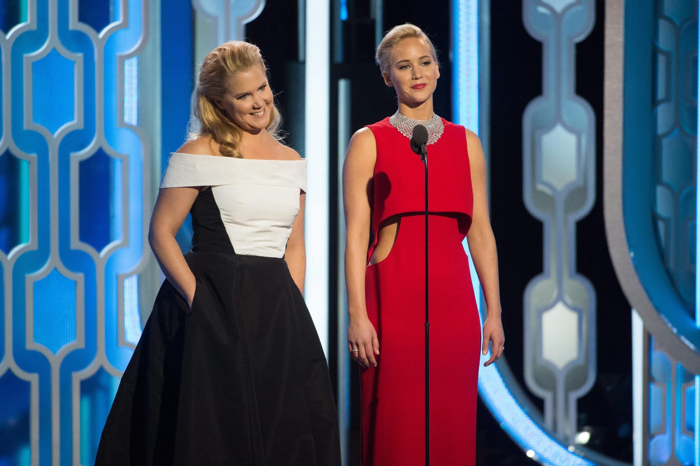 Amy Schumer and Jennifer Lawrence onstage at the 73rd Annual Golden Globe Awards at the Beverly Hilton in Beverly Hills in Beverly Hills, Calif. on Jan. 10, 2016.
