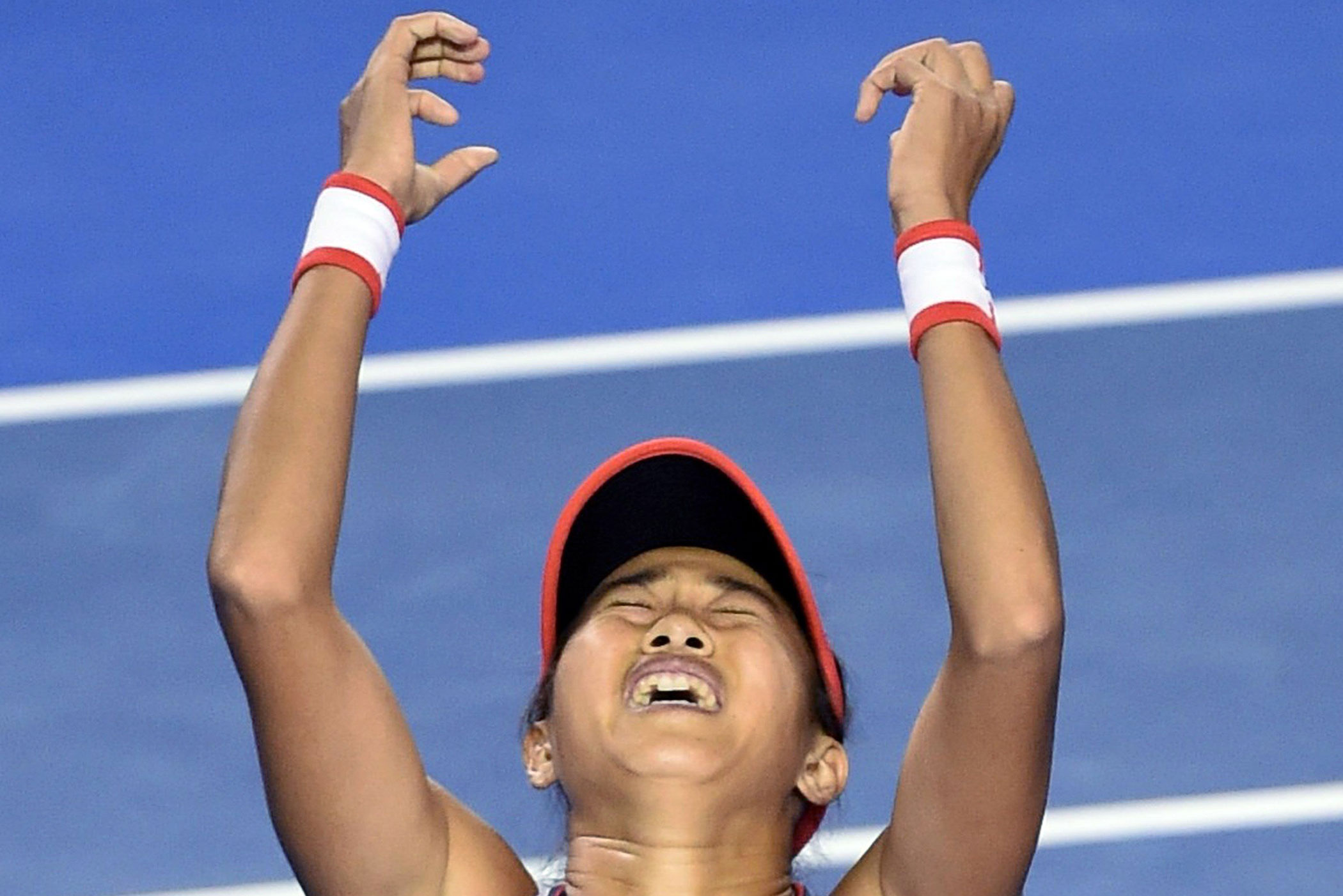 2016 Australian Open China's Zhang Shuai celebrates her victory in her women's singles match against United States' Madison Keys on Jan. 26.