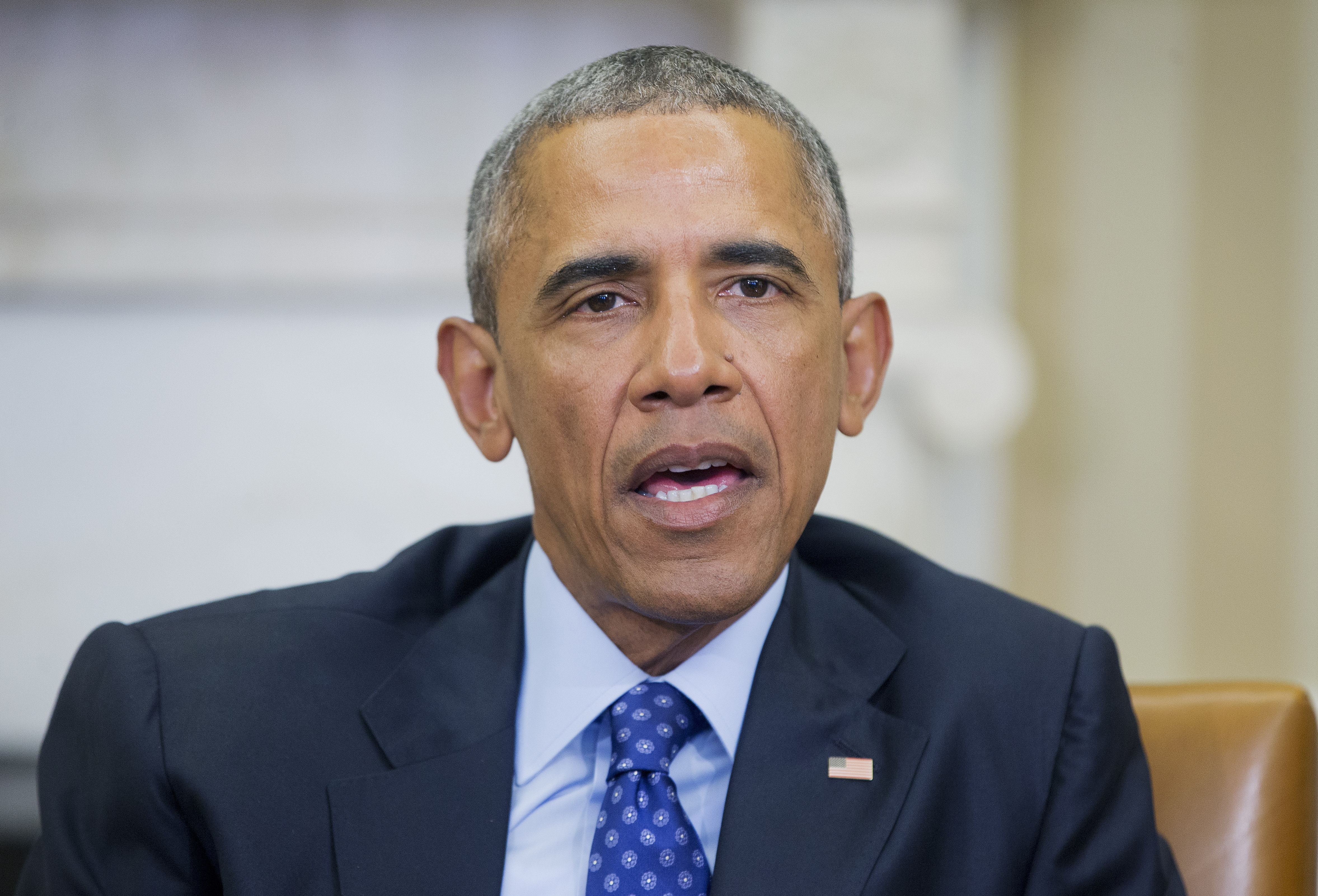 Barack Obama speaks in the Oval Office in Washington, D.C. on Jan. 4, 2016. (Pablo Martinez Monsivais—AP)