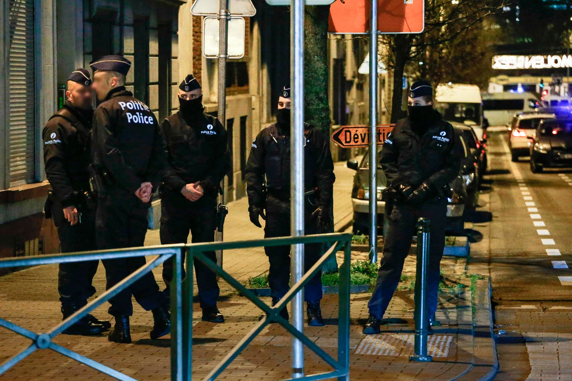 Belgian police conduct searches linked to the Paris attacks in Molenbeek, Brussels, on Dec. 30