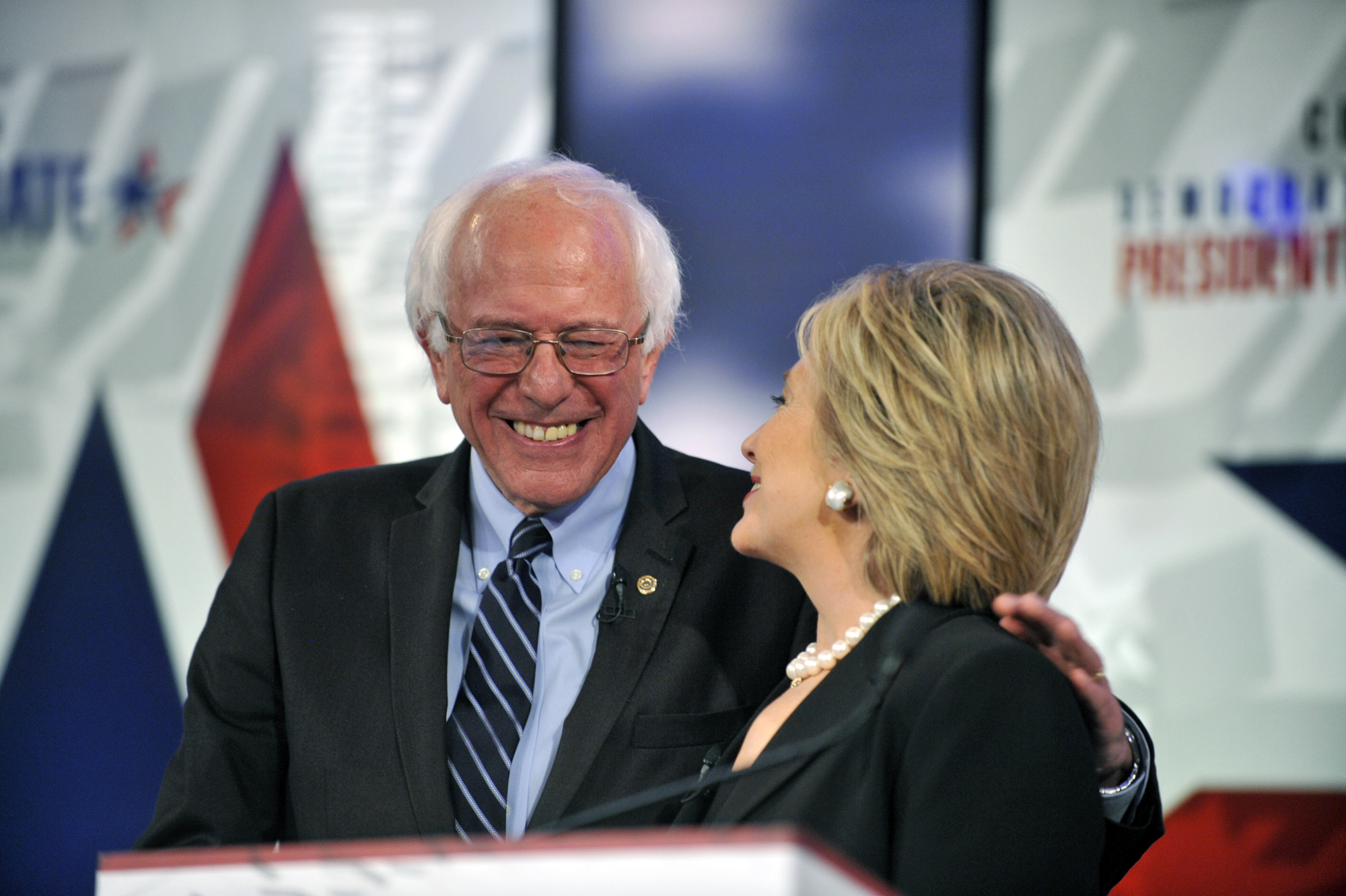Sen. Bernie Sanders and Former U.S. Secretary of State Hillary Clinton at the Democratic Presidential Debate in Des Moines, Iowa on Nov. 14, 2015. (Chris Usher—CBS/Getty Images)