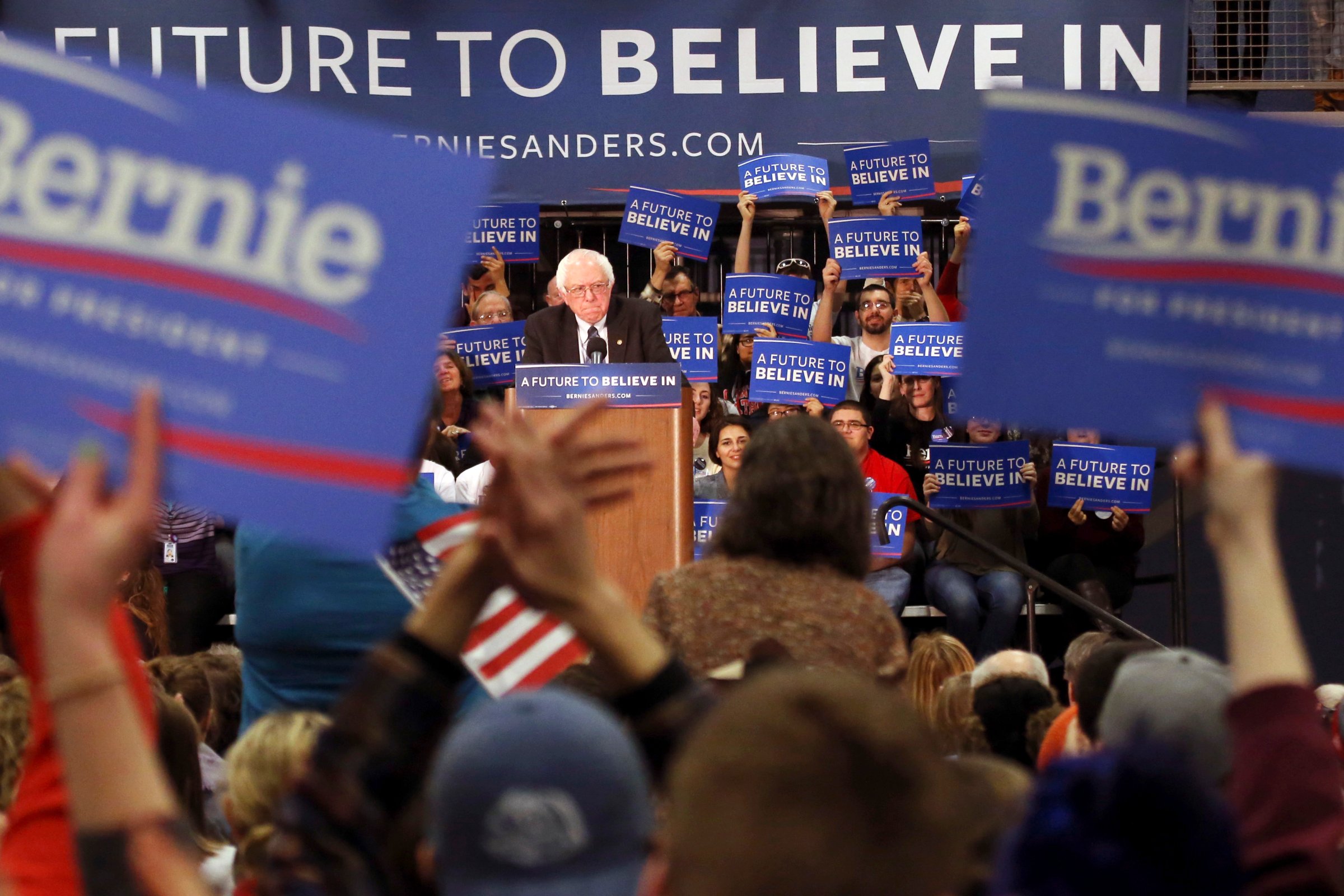 Supporters cheer as Democratic presidential candidate Sen. Bernie Sanders, I-Vt., speaks during a campaign stop on Jan. 4, 2016, in Manchester, N.H.
