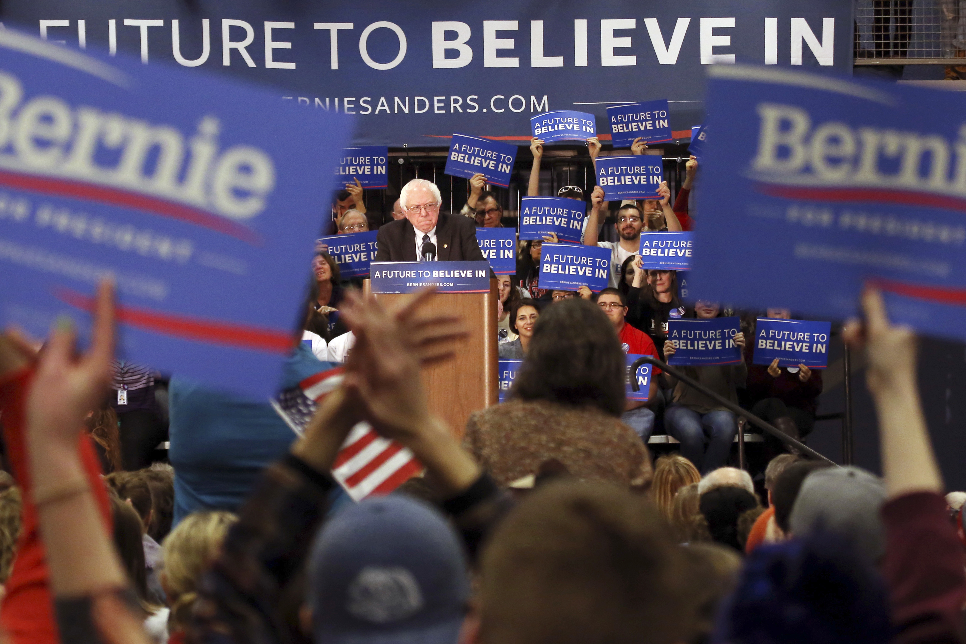 Supporters cheer as Democratic presidential candidate Sen. Bernie Sanders, I-Vt., speaks during a campaign stop on Jan. 4, 2016, in Manchester, N.H. (Mary Schwalm—AP)