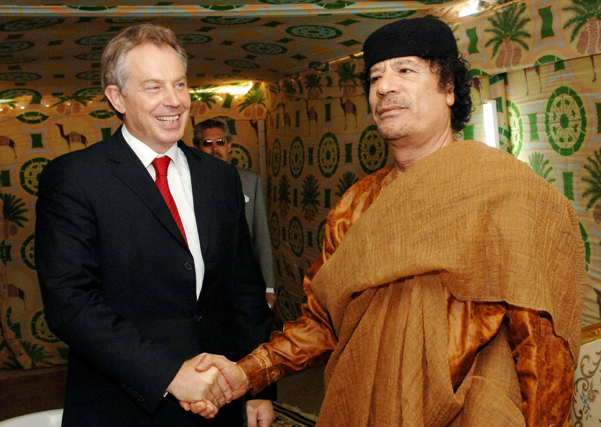Prime Minister Tony Blair meeting Libyan leader Colonel Muammar Gaddafi at his desert base outside Sirte, south of Tripoli on May 29, 2007.