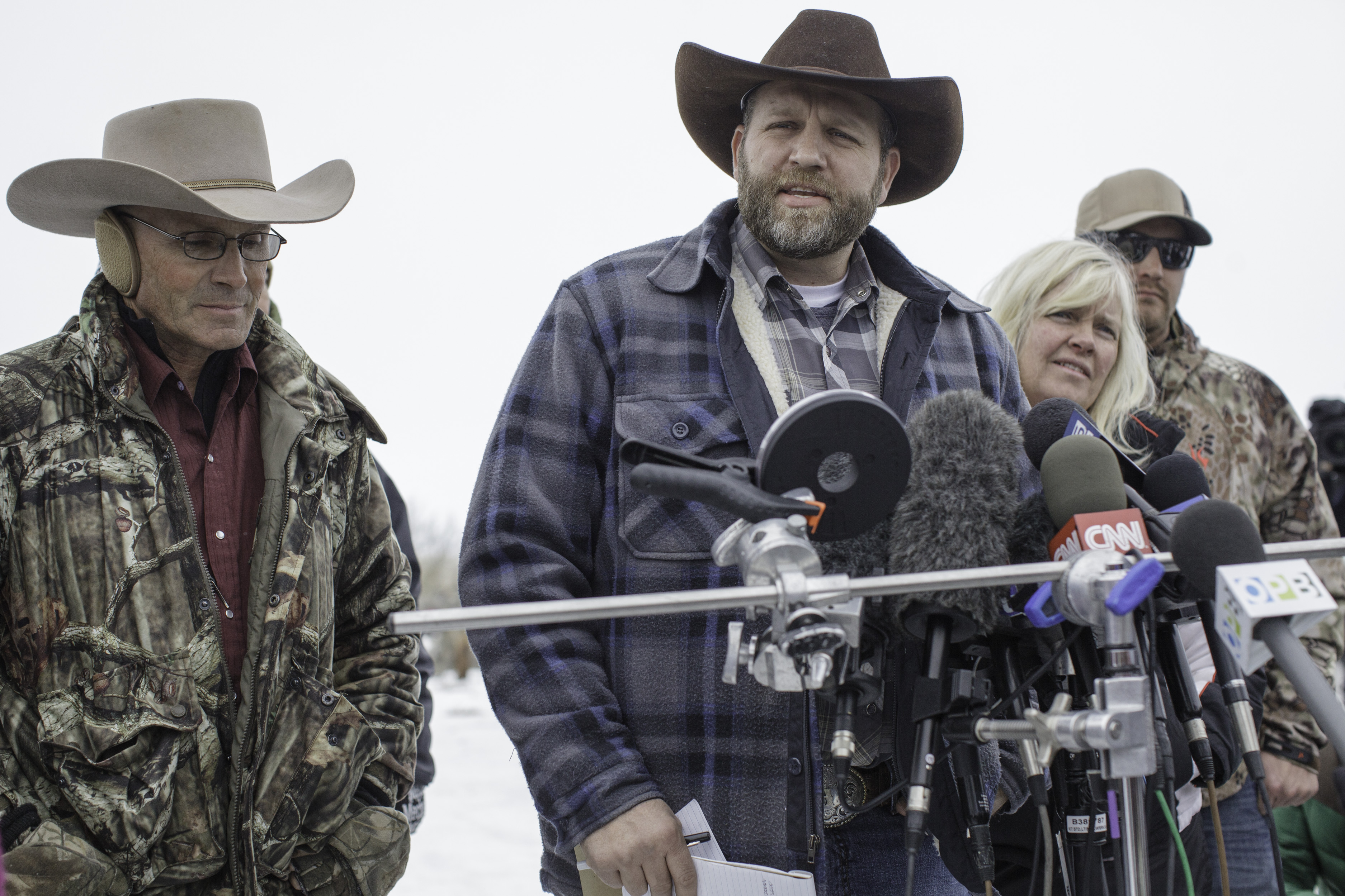 Ammon Bundy (C), leader of an armed anti-government militia, makes a statement at a news conference at the Malheur National Wildlife Refuge Headquarters near Burns, Ore., on Jan. 5, 2016. (Rob Kerr—AFP/Getty Images)