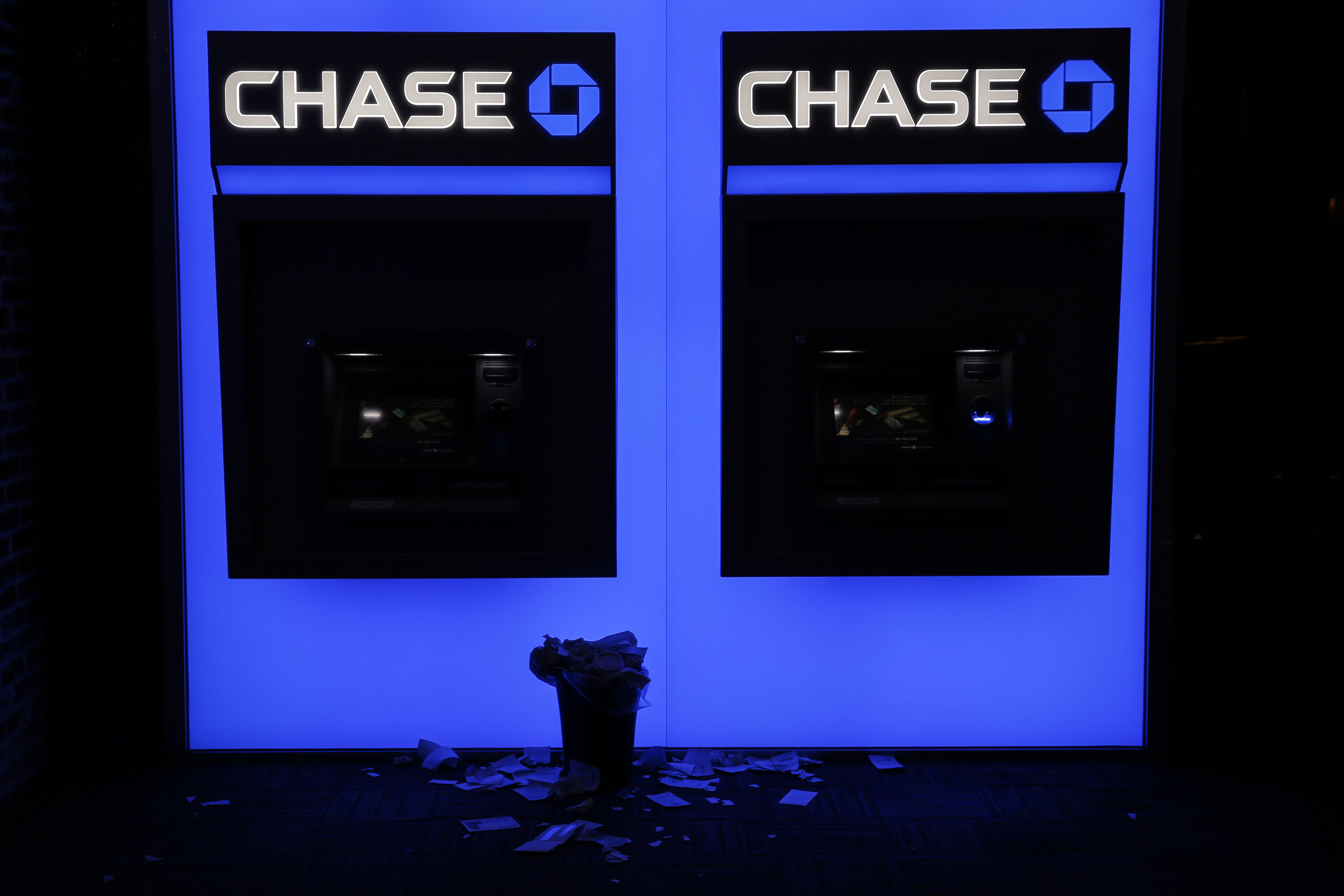 Receipts rest beneath JPMorgan Chase &amp; Co. bank ATMs in San Diego, California, U.S., on Wednesday, July 8, 2015. (Patrick T. Fallon—Bloomberg/Getty Images)