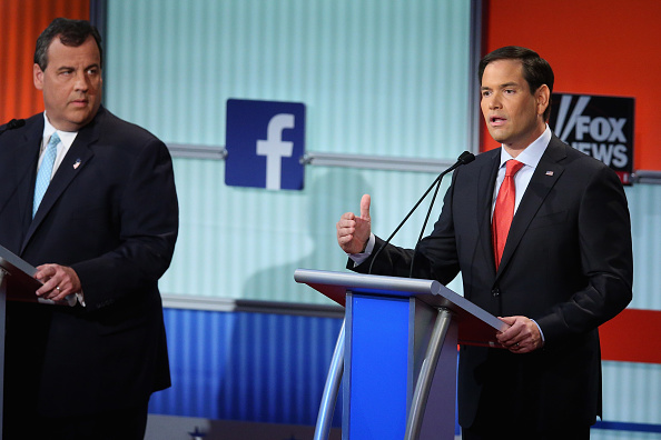 Republican presidential candidates New Jersey Gov. Chris Christie (L) and Sen. Marco Rubio (R-FL) participate in the first prime-time presidential debate hosted by FOX News and Facebook at the Quicken Loans Arena August 6, 2015 in Cleveland, Ohio.