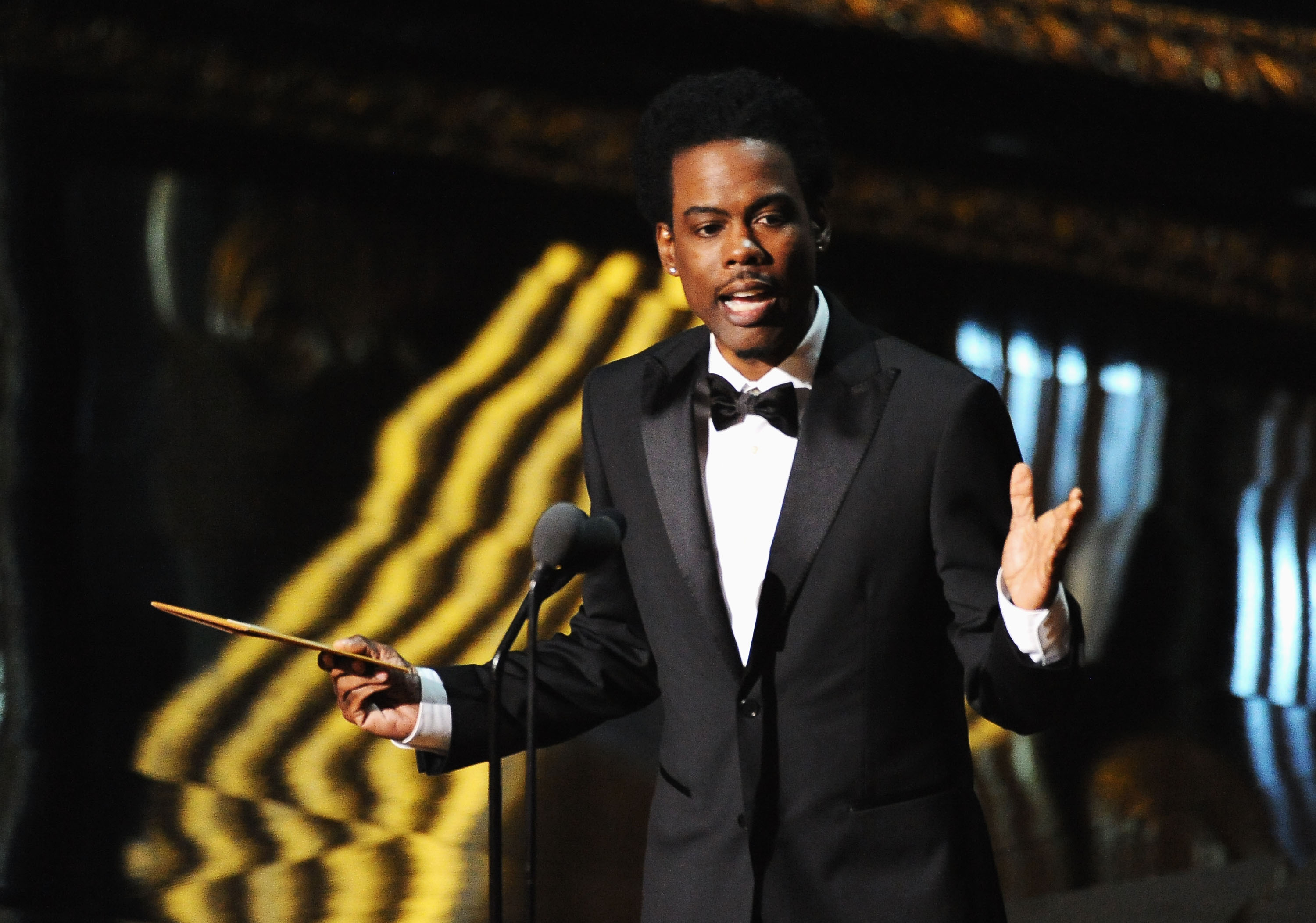 Chris Rock presenting at the Academy Awards in 2012. (Mark Davis—WireImage)