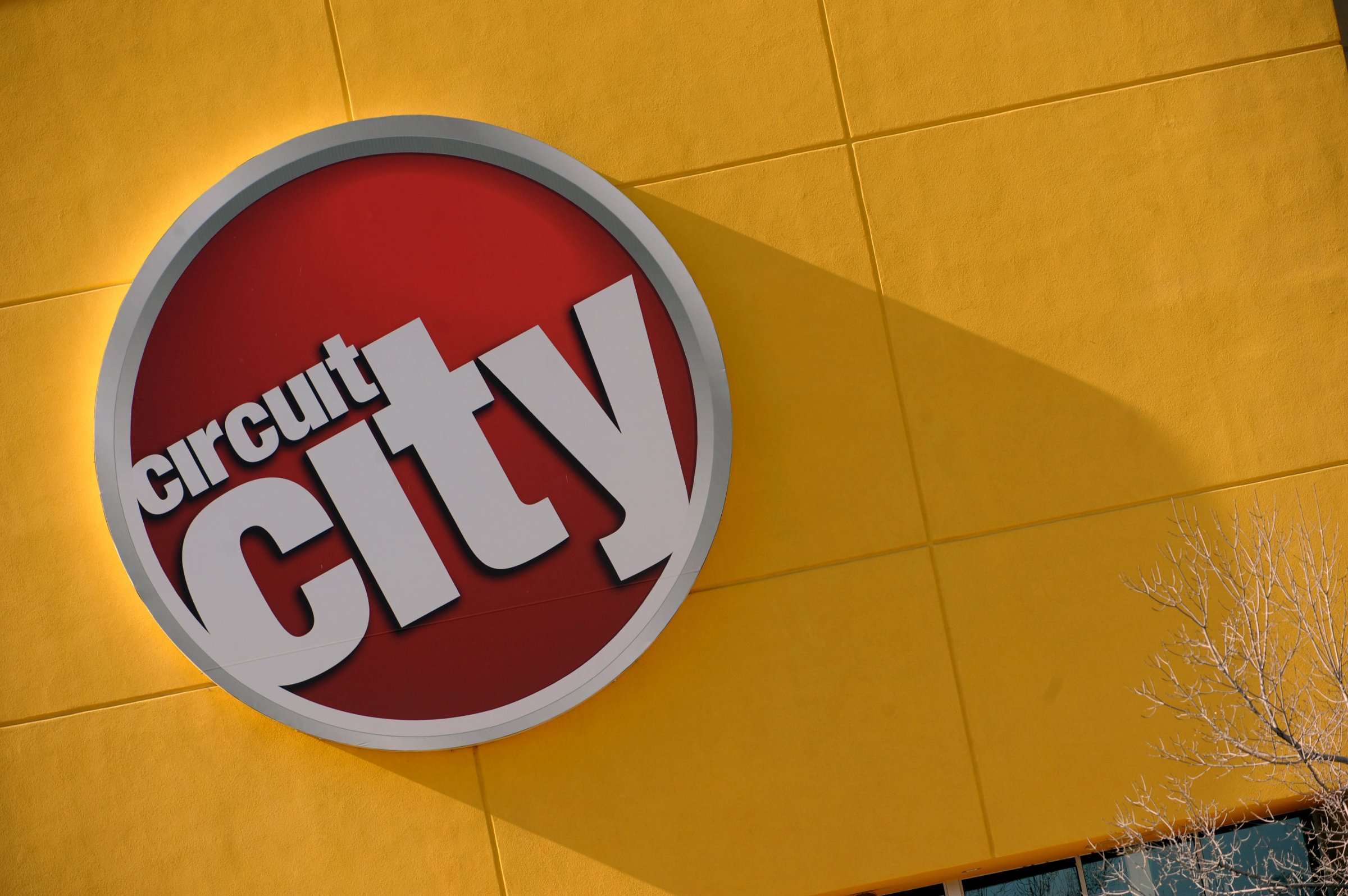 A Circuit City sign hangs outside a store in Denver.