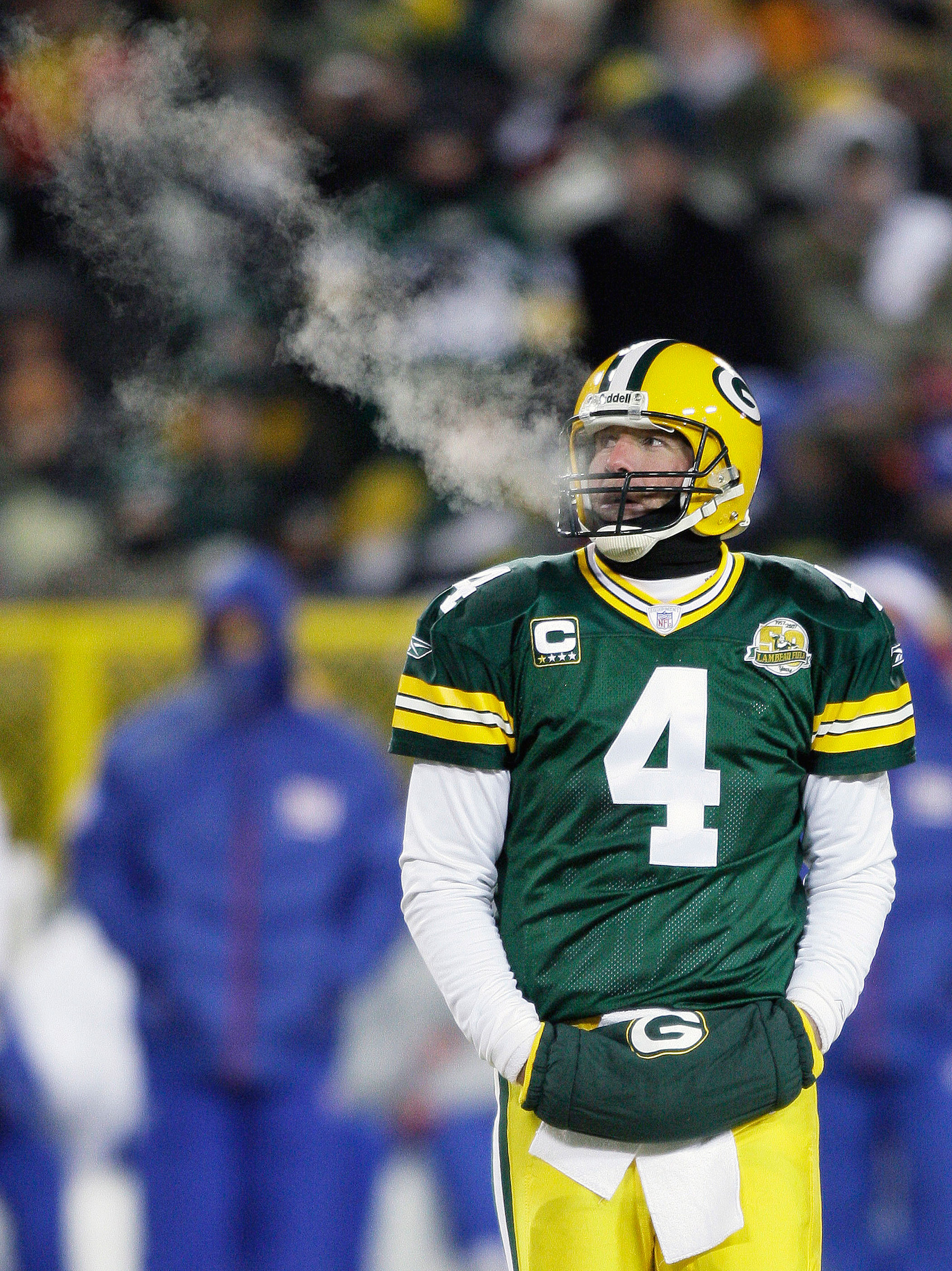 Temperature: -4°F (Wind Chill: -24°F). On Jan. 20, 2008, the Green Bay Packers faced the New York Giants in a frigid NFC championship football game. Here, Packers quarterback Brett Favre warms his hands at Lambeau Field in Green Bay, Wis.