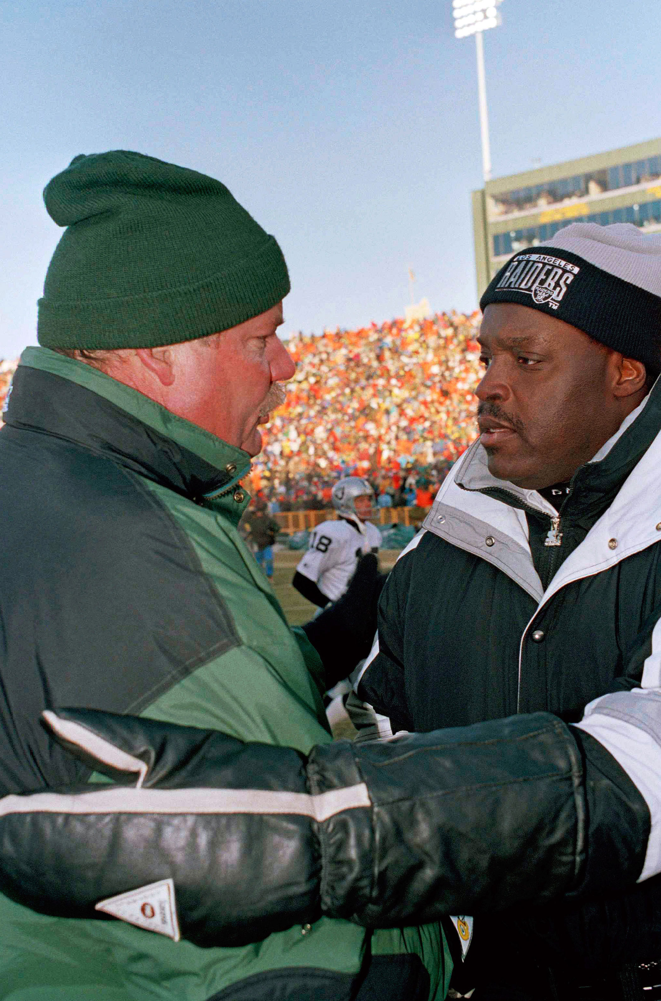 Temperature: 0°F On Dec. 26, 1993, the Green Bay Packers faced the Los Angeles Raiders in an NFL football game. Here, coaches Mike Holmgran and Art Shell greet each other in Green Bay, Wis.