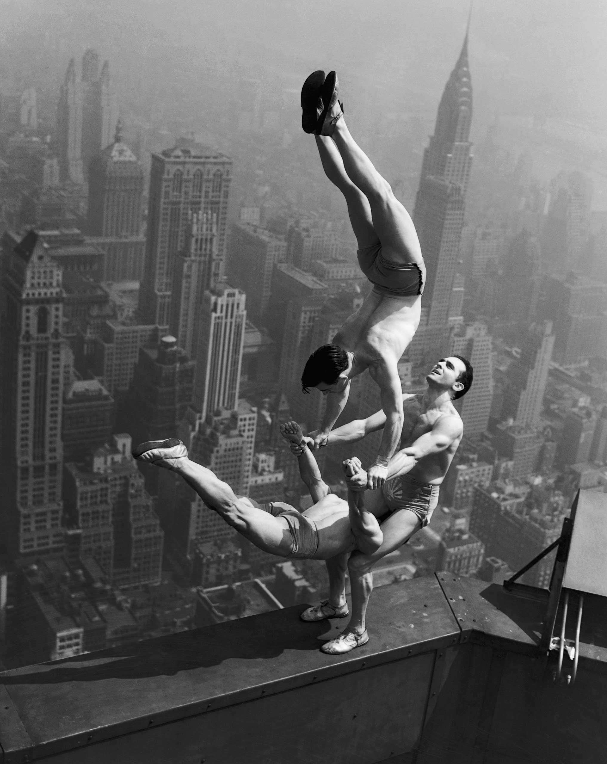 Acrobats Performing on the Empire State Building