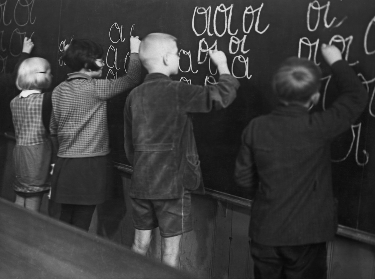 German children work on their handwriting, circa 1950. (FPG / Getty Images)