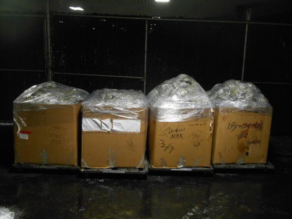 Boxes of bundles containing 2,072 pounds of marijuana seized by CBP officers at World Trade Bridge