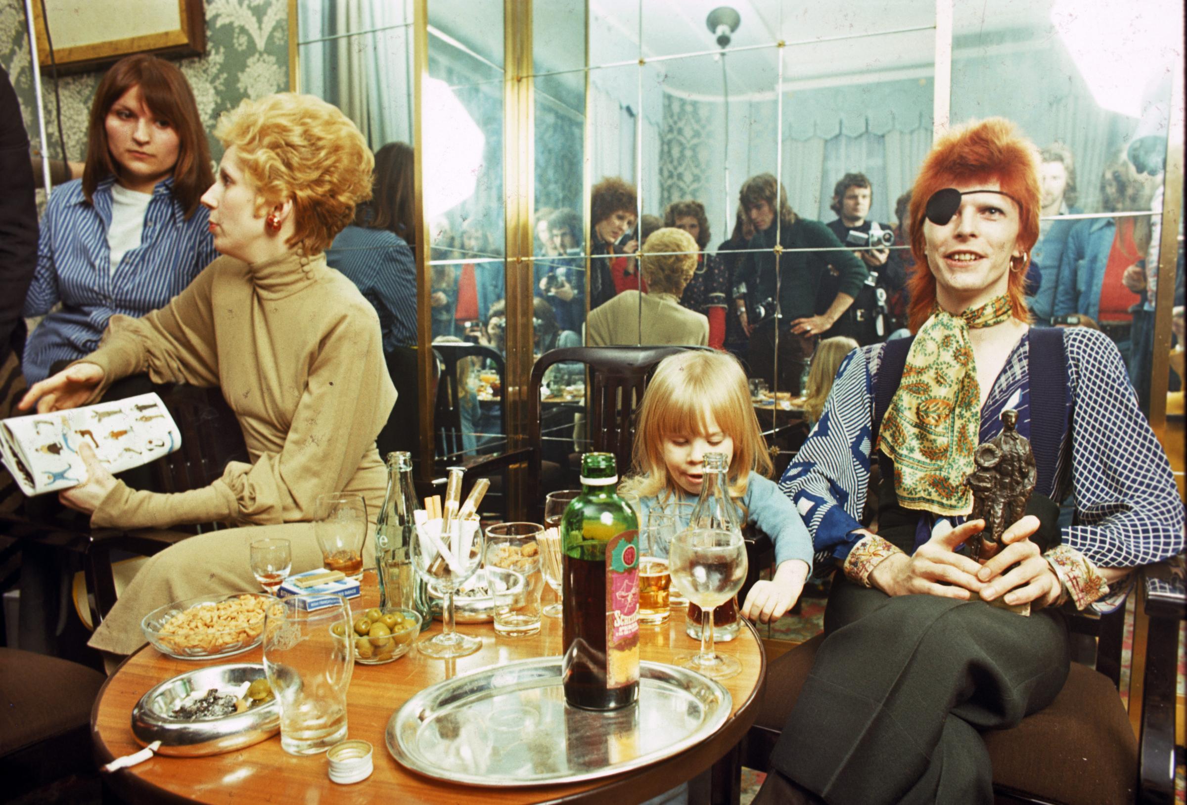 From left: Angie Bowie, his son Zowie Bowie (Duncan Jones) and David Bowie, appear at a press conference at the Amstel Hotel on Feb. 7, 1974 in Amsterdam, Netherlands.