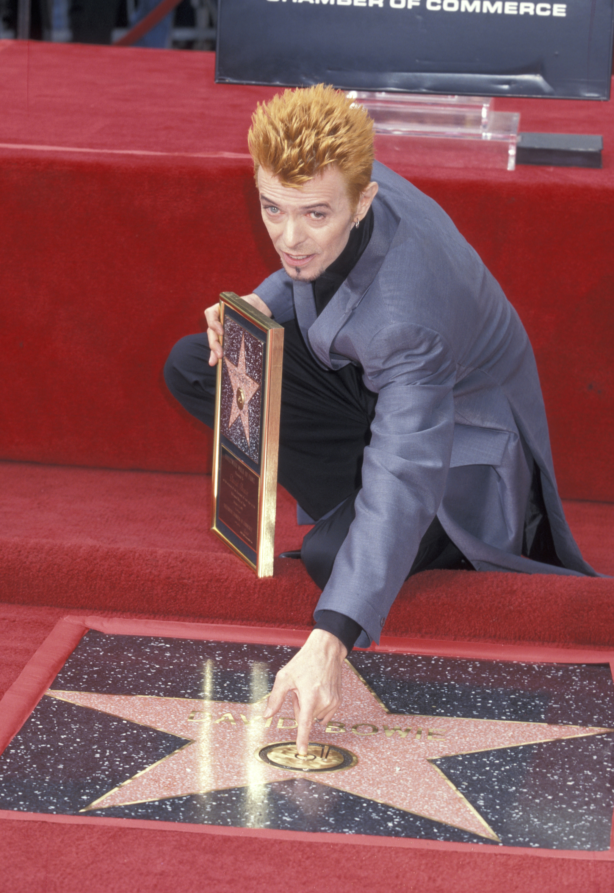 David Bowie is seen while being honored with a star on the Hollywood Walk of Fame in Hollywood, Calif. on Feb. 12, 1997.