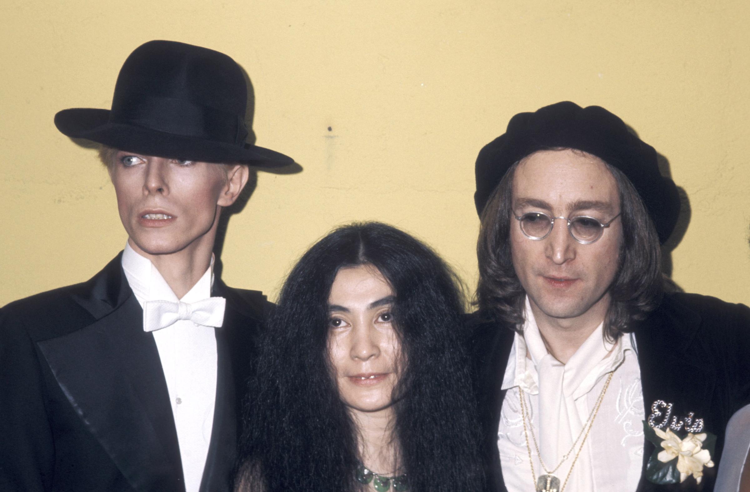 From left: David Bowie, Yoko Ono and John Lennon at the 17th Annual Grammy Awards on Feb. 28, 1975 in New York City.