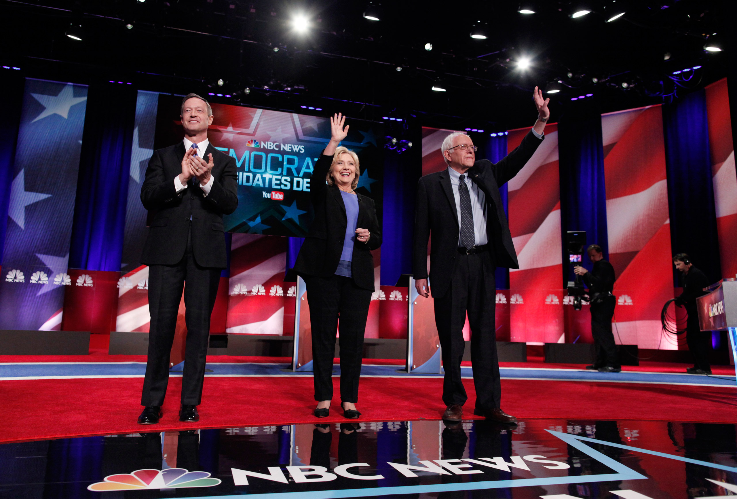 Democratic U.S. presidential candidates (L-R) former Governor Martin O'Malley, former Secretary of State Hillary Clinton and Senator Bernie Sanders pose together before the start of the NBC - YouTube Democratic presidential debate at the Gaillard Center in Charleston, S.C. on Jan. 17, 2016. (Randall Hill—Reuters)