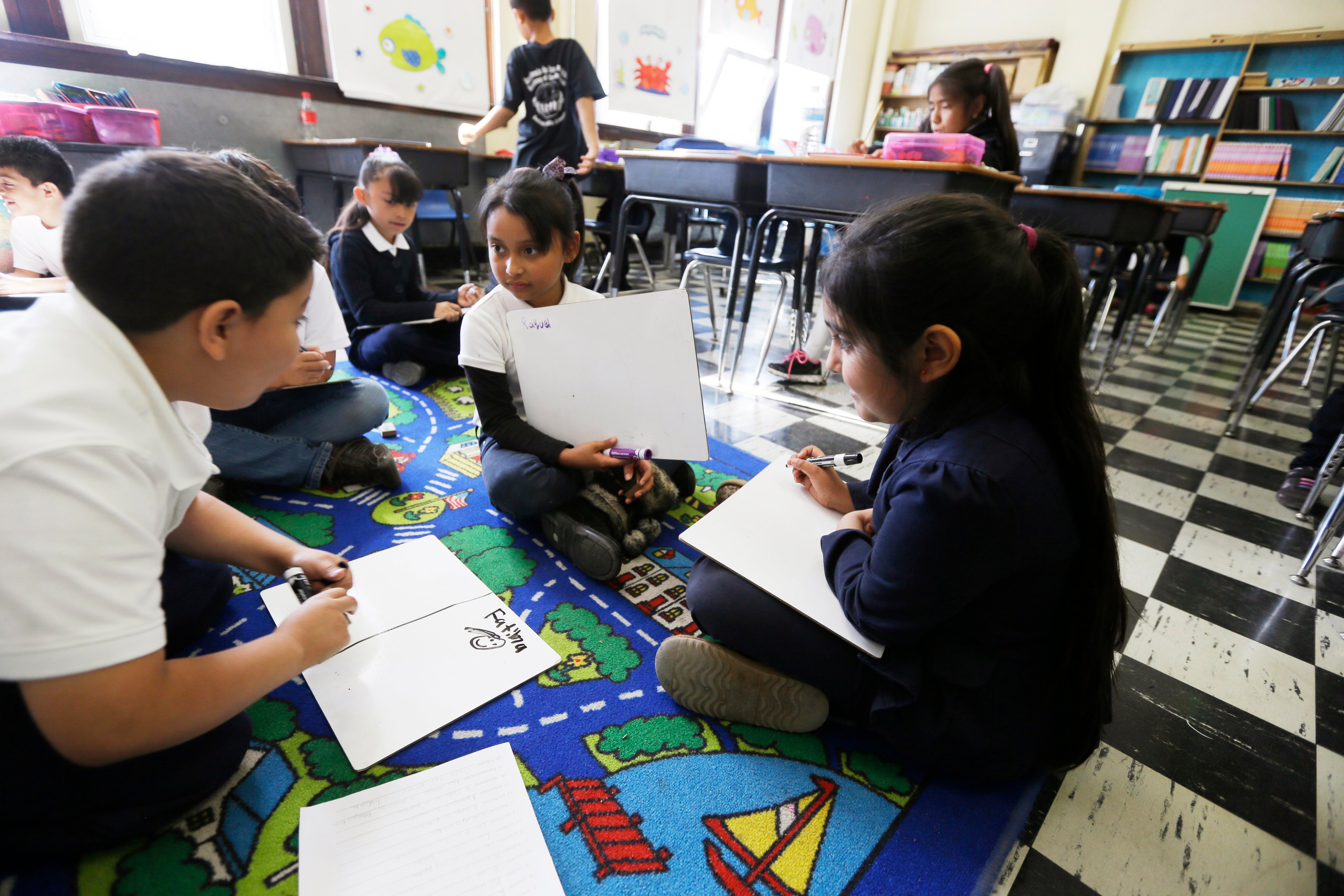Students work on reading skills at the Detroit Public Schools' Academy of the Americas in Detroit  Sept. 19, 2014. (Carlos Osorio—AP)