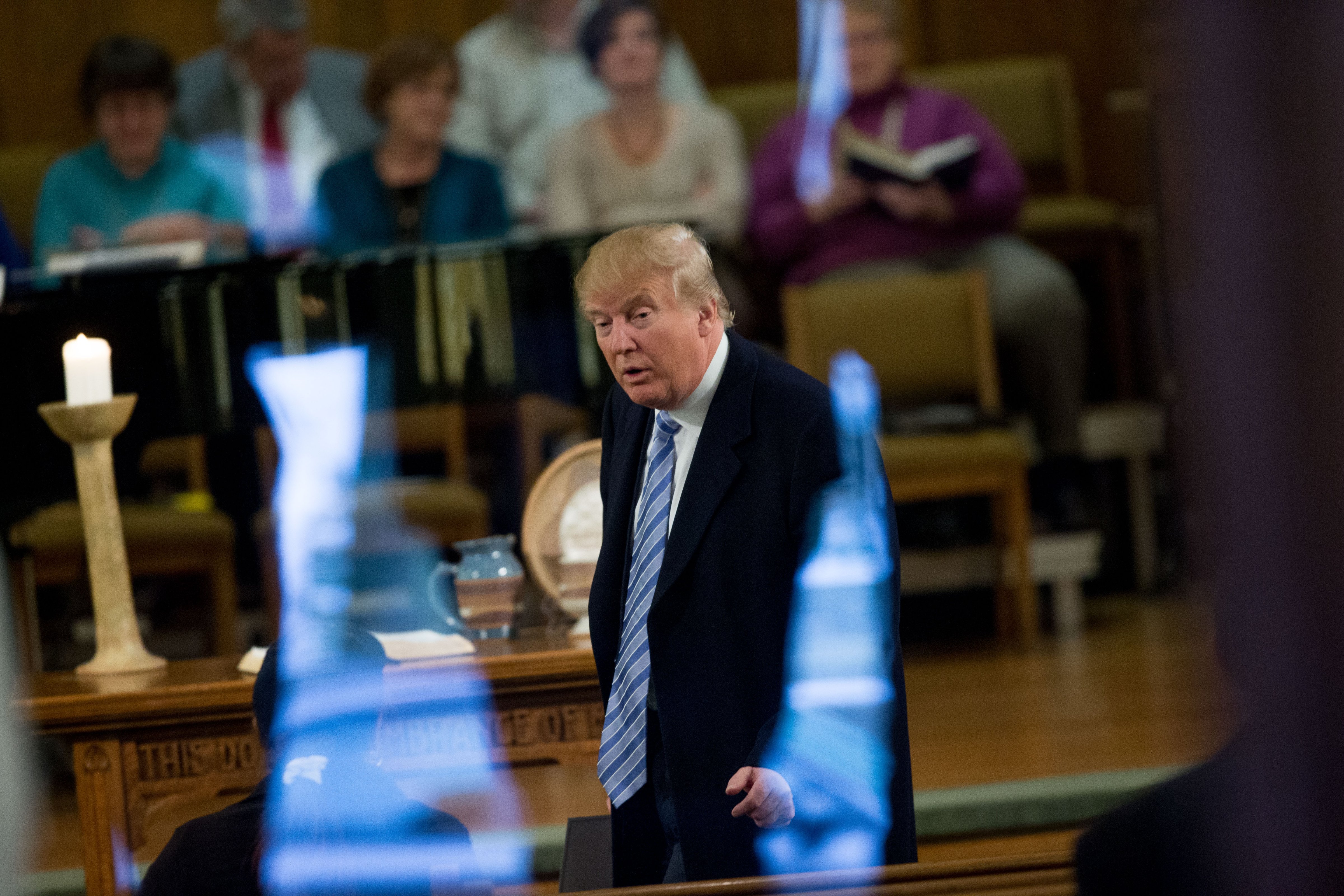 Republican presidential candidate Donald Trump arrives for service at First Presbyterian Church in Muscatine, Iowa, Sunday, Jan. 24, 2016. (Andrew Harnik—AP)