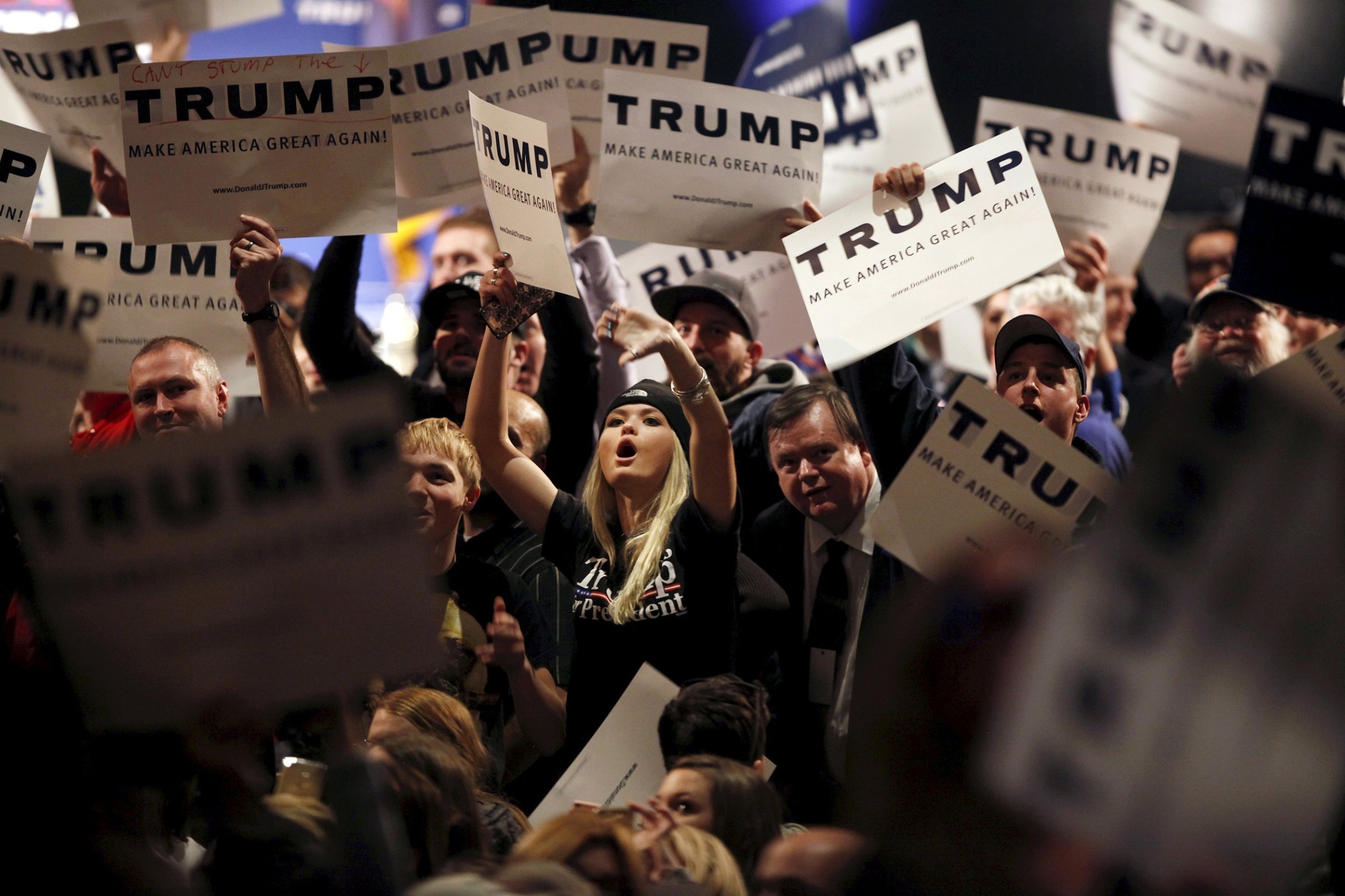 Supporters of U.S. Republican presidential candidate Donald Trump jeer at protesters during a campaign rally in Burlington, Vt. on Jan. 7, 2016.
