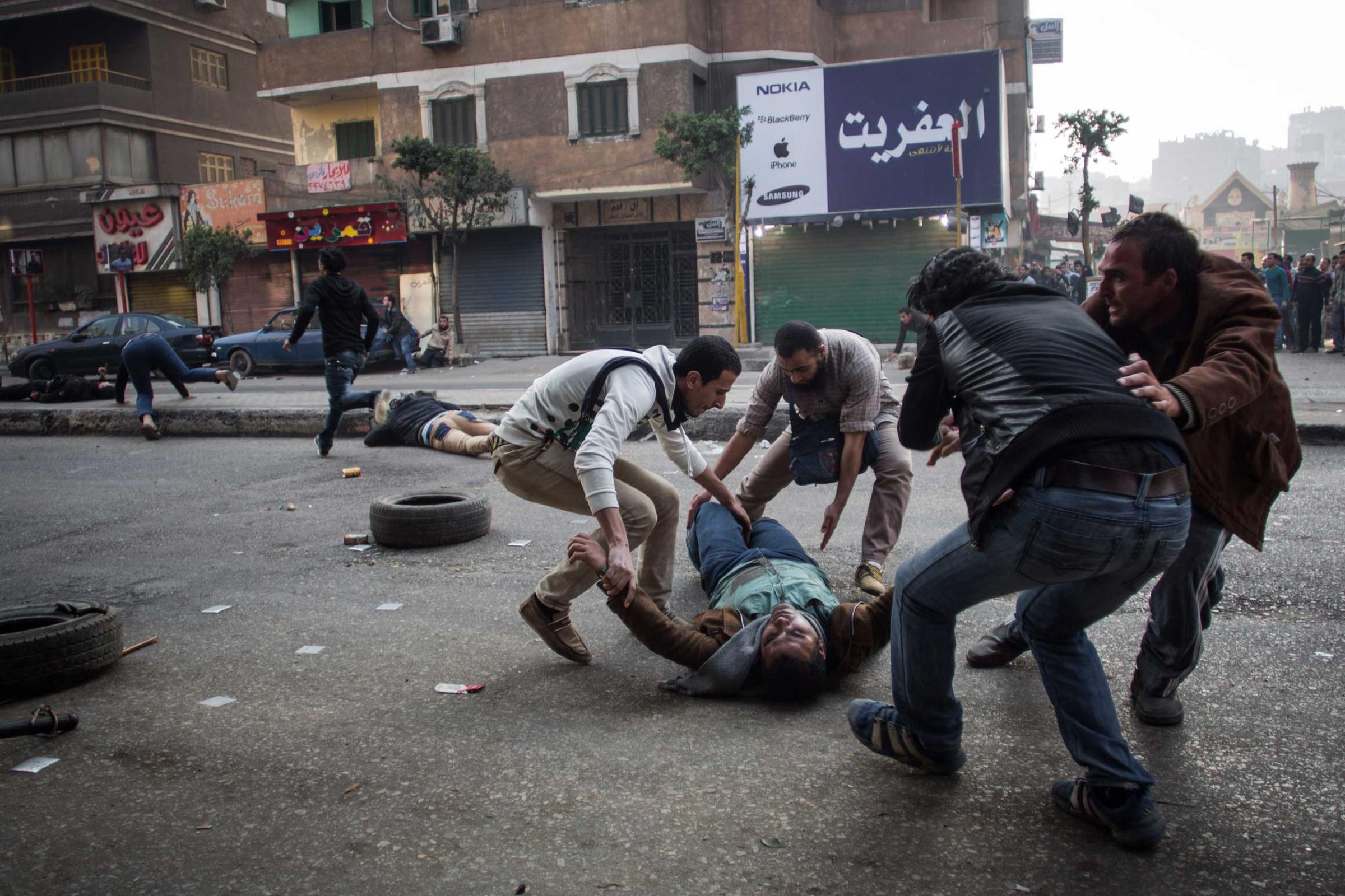 Clashes on the third anniversary of Egypt's revolution in Mohandeseen in Giza , Jan. 25, 2014.