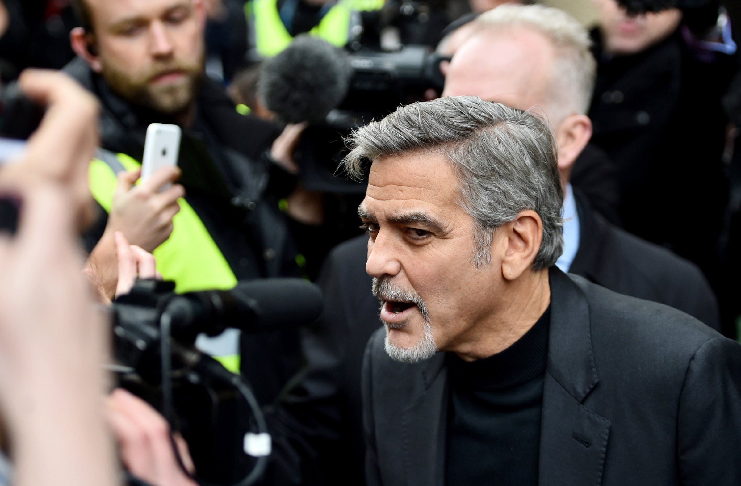 Hollywood actor George Clooney, meets members of the public during a visit to Social Bite sandwich shop which helps homeless people on November 12, 2015 in Edinburgh,Scotland.