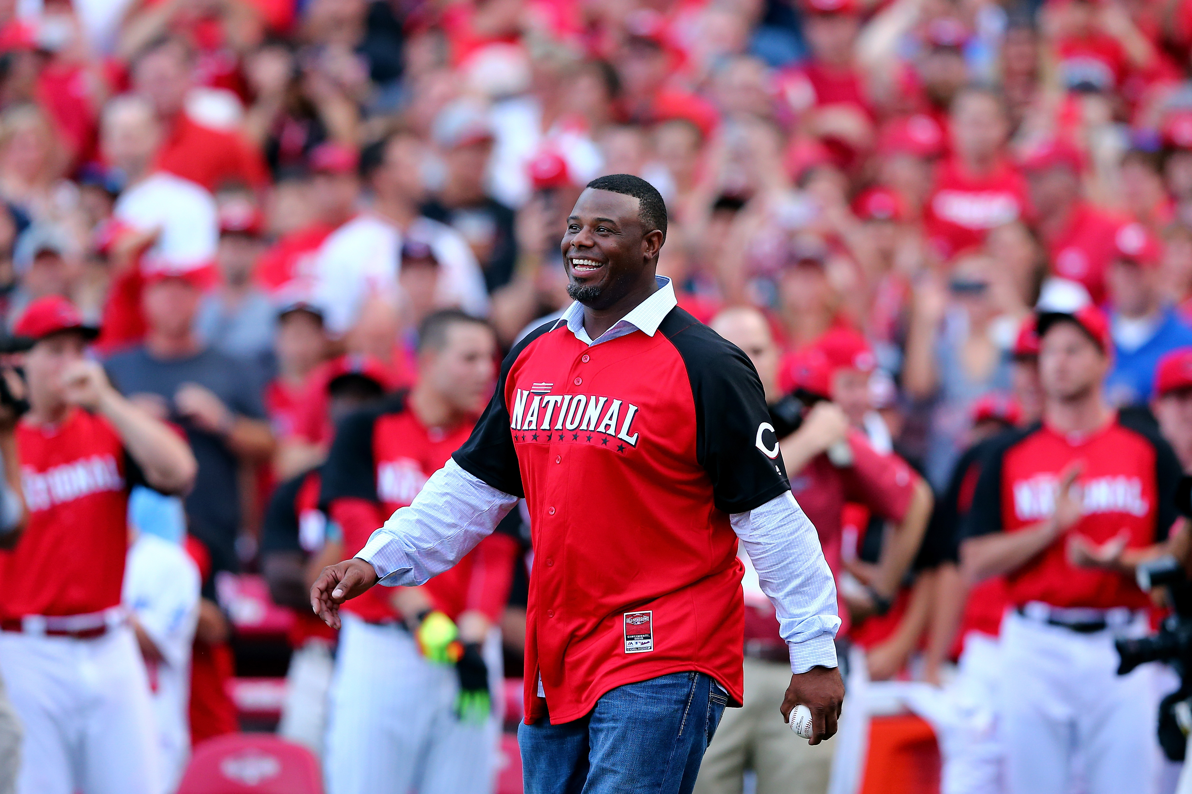 Ken Griffey Jr. walks out to throw the first pitch prior to the Gillette Home Run Derby presented by Head &amp; Shoulders at the Great American Ball Park in Cincinnati on July 13, 2015. (Elsa—Getty Images)