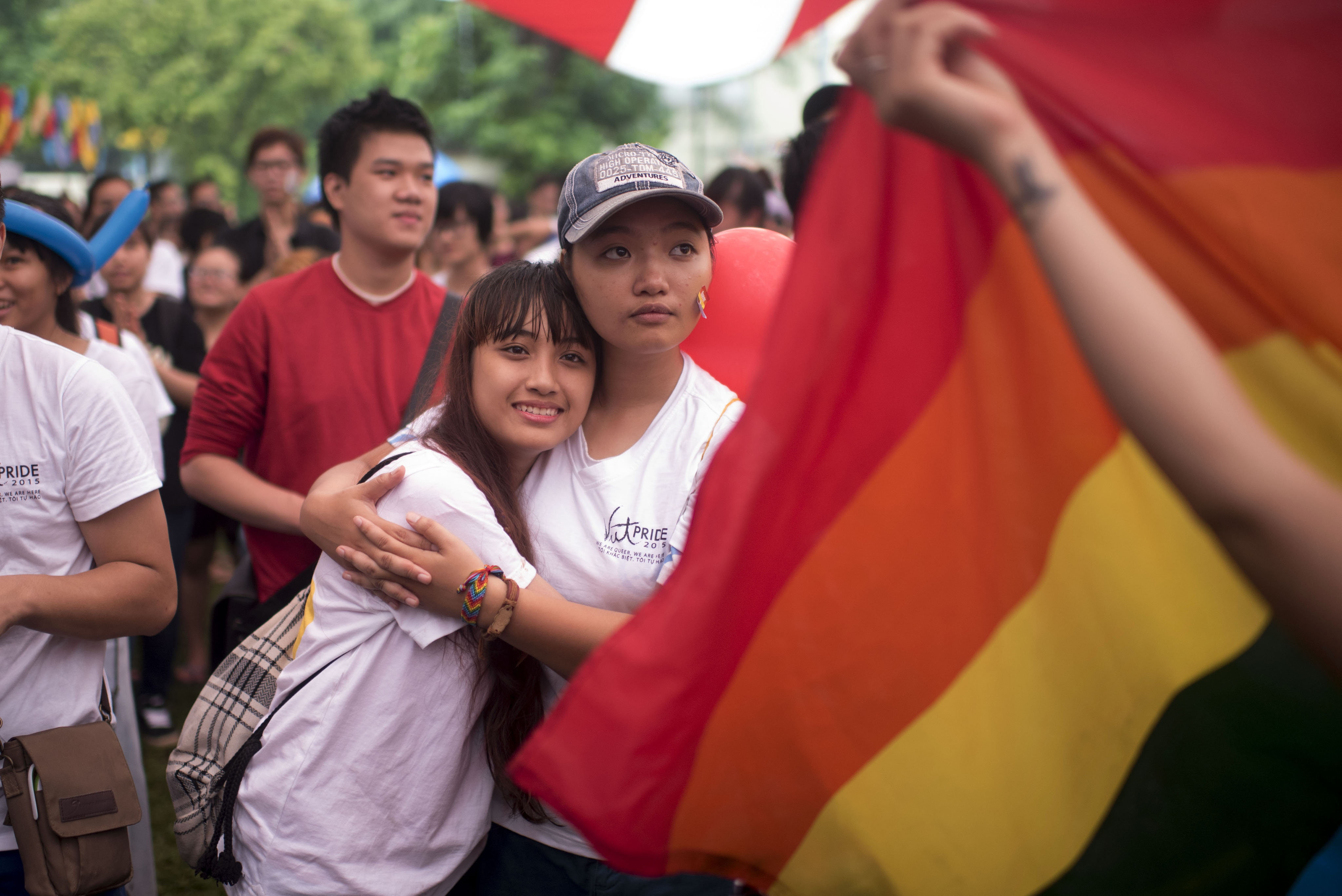 Two Vietnamese girls hug each other during the fourth gay-pride parade on Aug. 2, 2015, in Hanoi (Borja Sanchez Trillo—Getty)